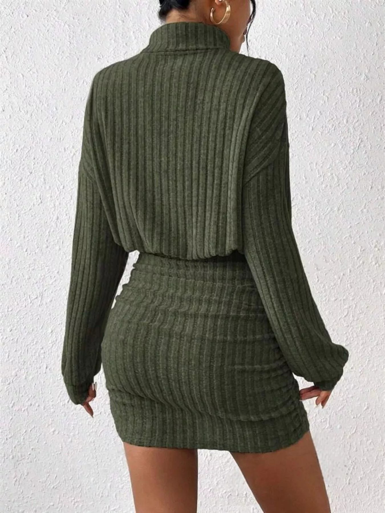 Ribbed Knit Turtleneck Bodycon Mini Dress designed for comfort and style at Lookzlike