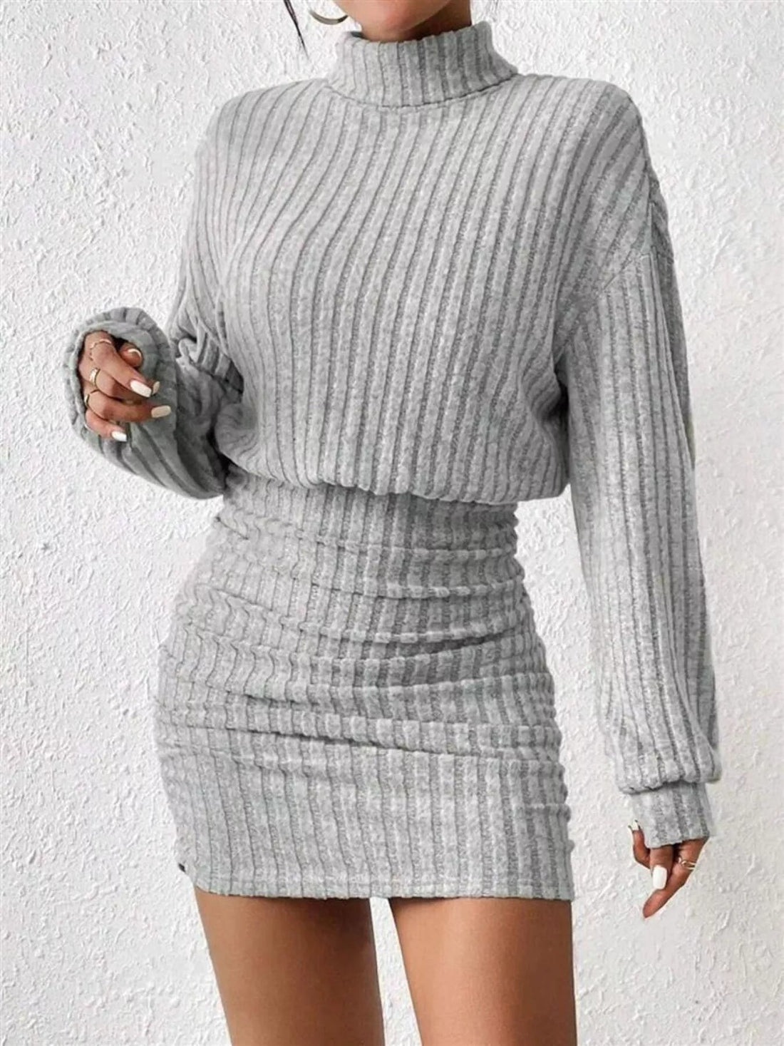 Ribbed Knit Turtleneck Bodycon Mini Dress designed for comfort and style at Lookzlike