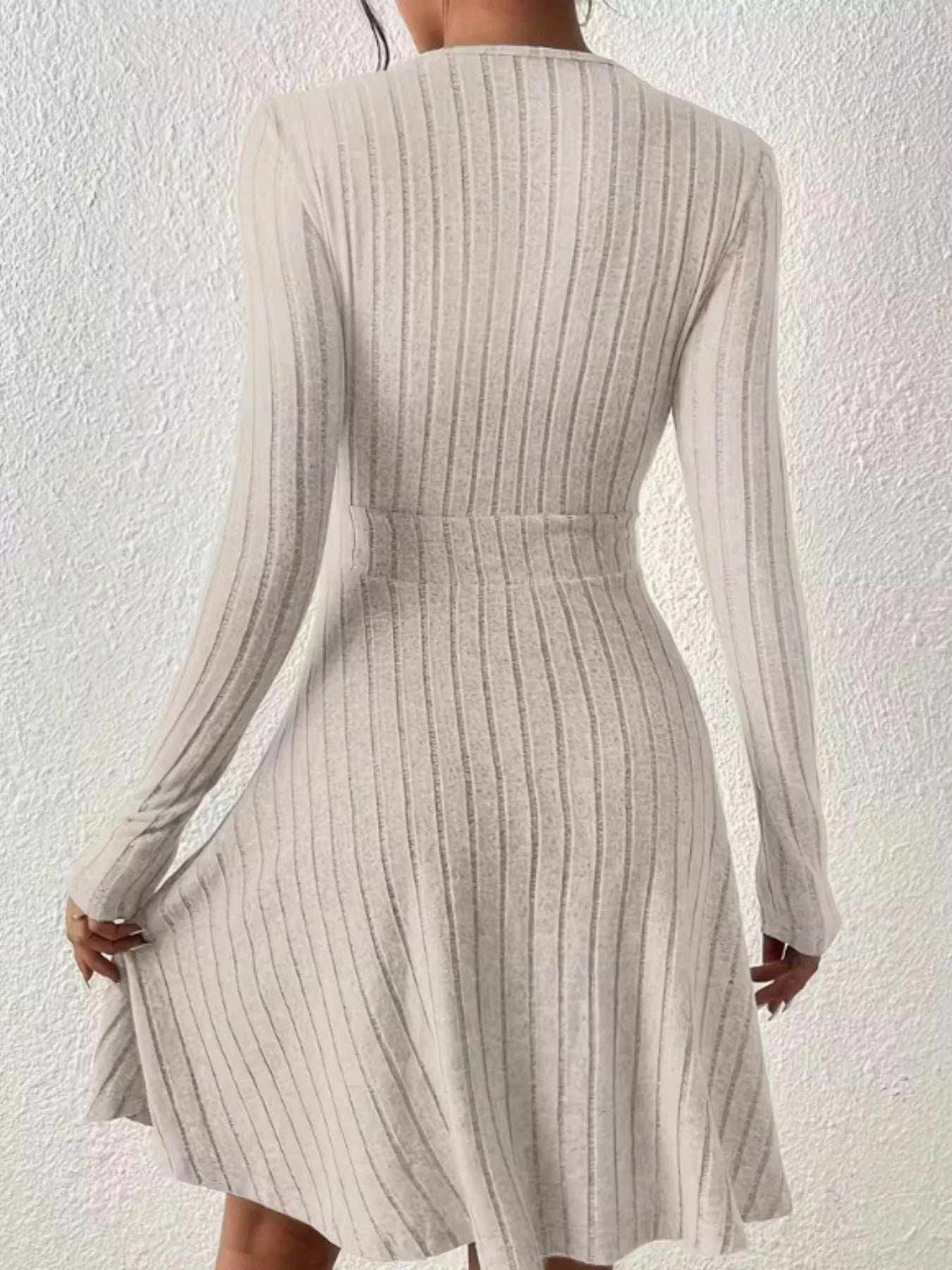 Ribbed Knit Wrap Mini Dress designed for comfort and style at Lookzlike