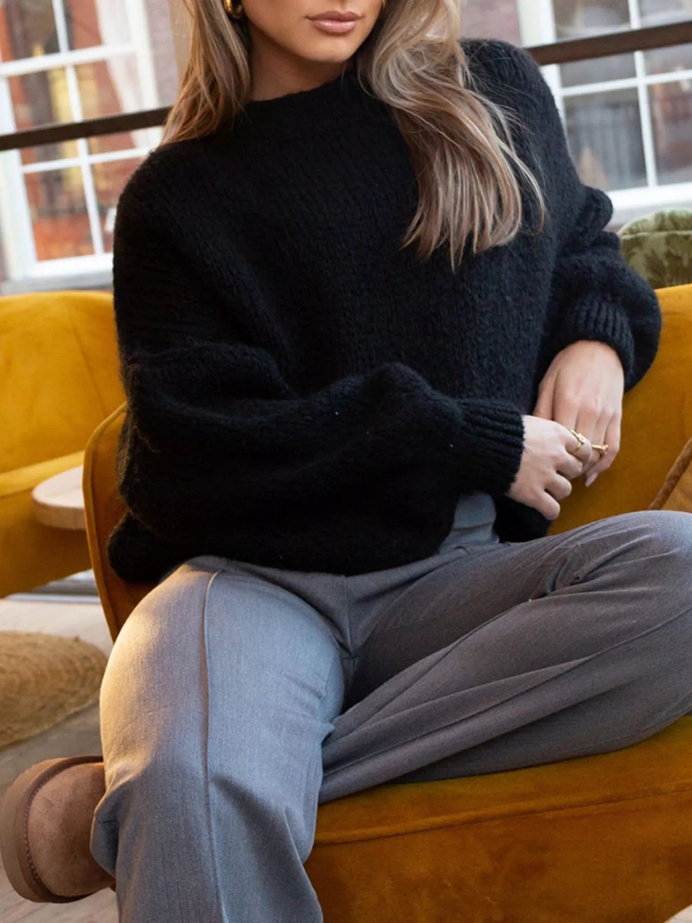 Round Neck Dropped Shoulder Sweater designed for comfort and style at Lookzlike