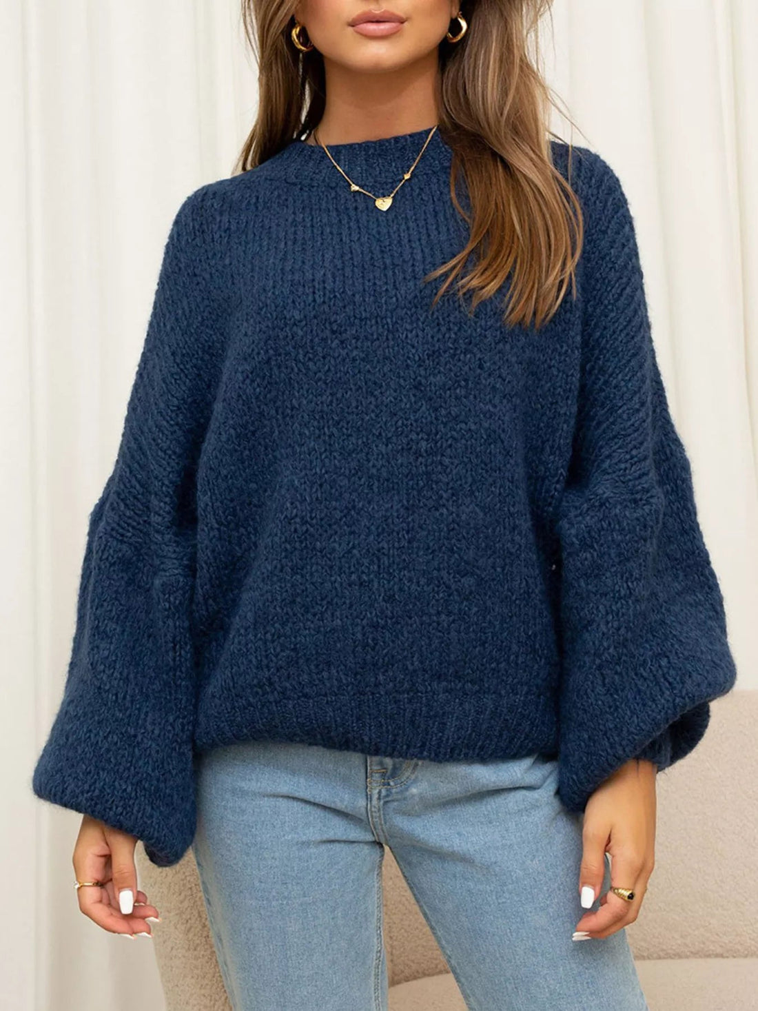 Round Neck Dropped Shoulder Sweater designed for comfort and style at Lookzlike