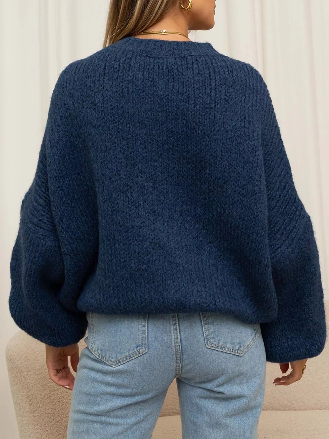 Round Neck Dropped Shoulder Sweater designed for comfort and style at Lookzlike