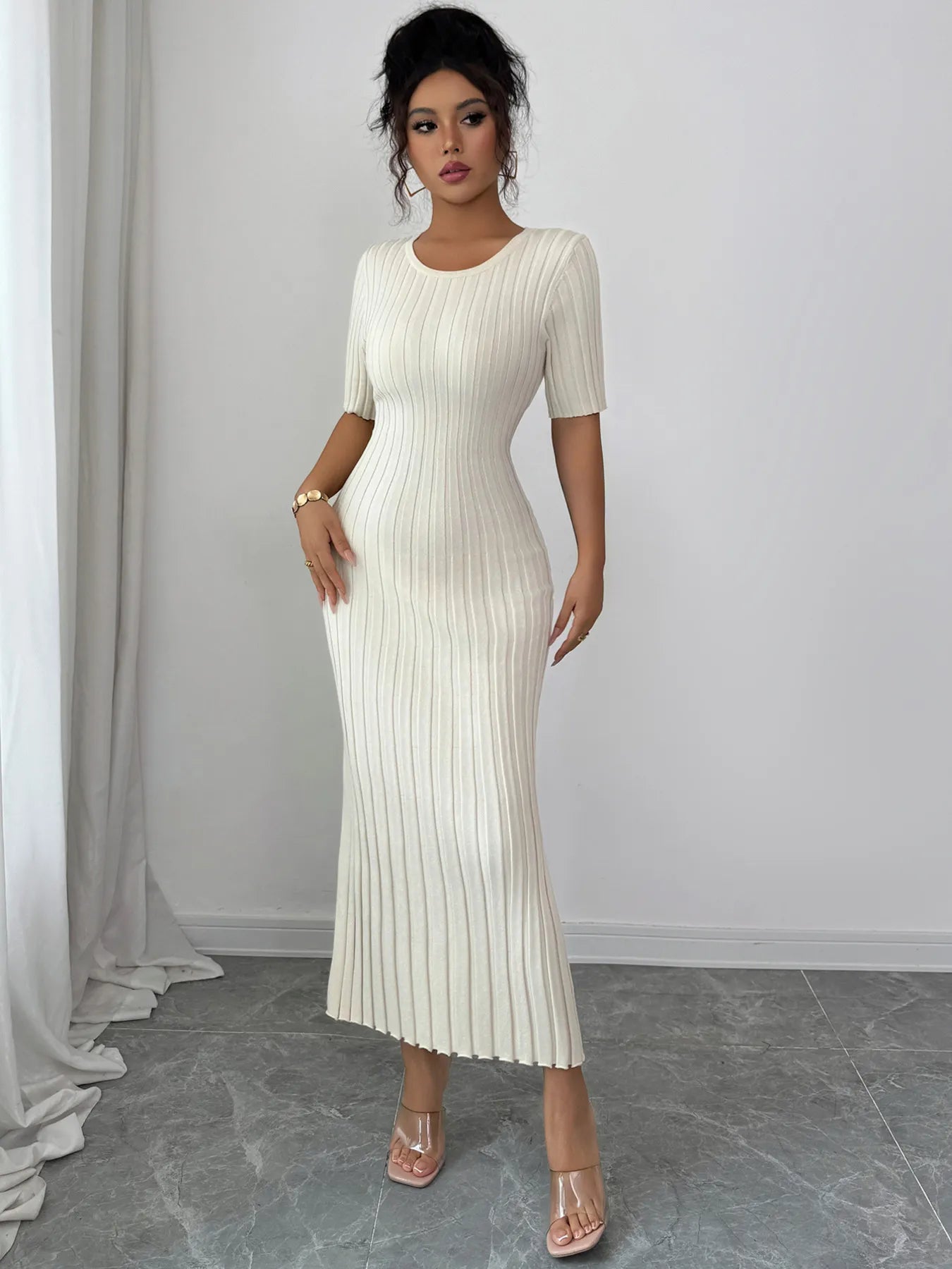 Round Neck Short Sleeve Sweater Dress designed for comfort and style at Lookzlike