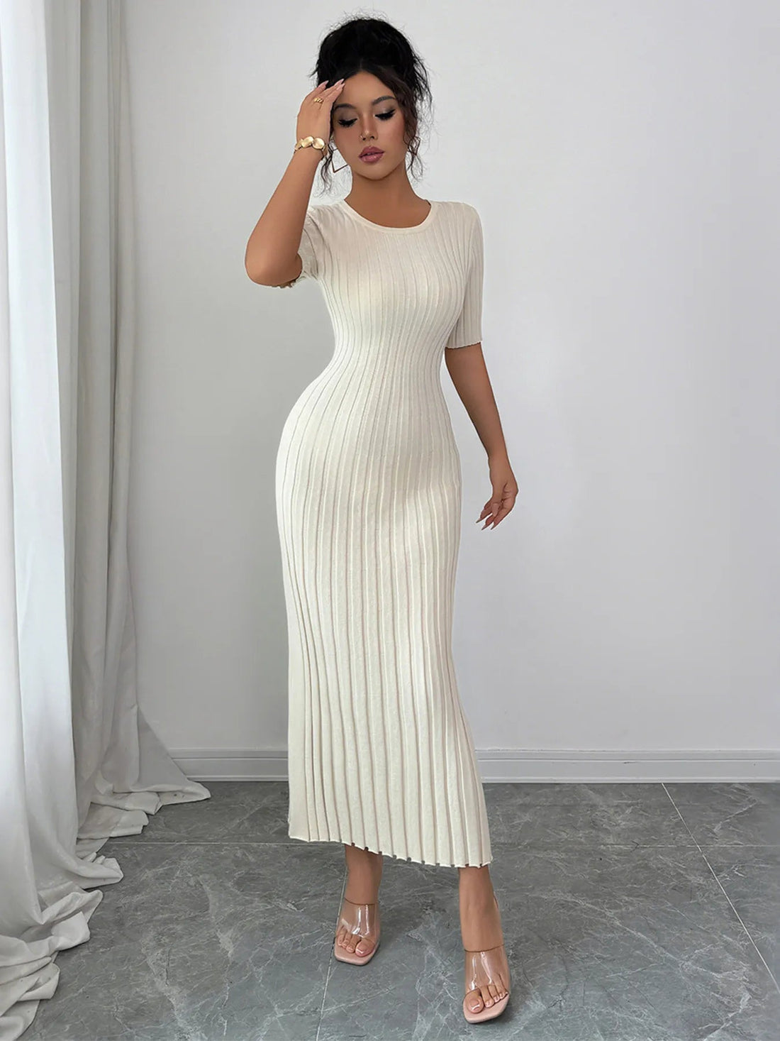 Round Neck Short Sleeve Sweater Dress designed for comfort and style at Lookzlike