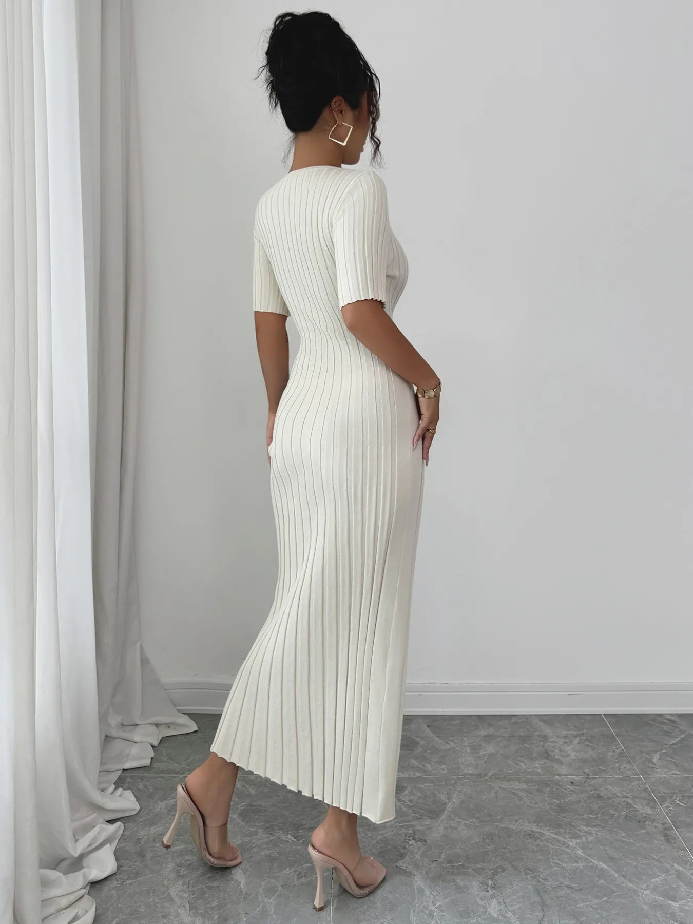 Round Neck Short Sleeve Sweater Dress designed for comfort and style at Lookzlike