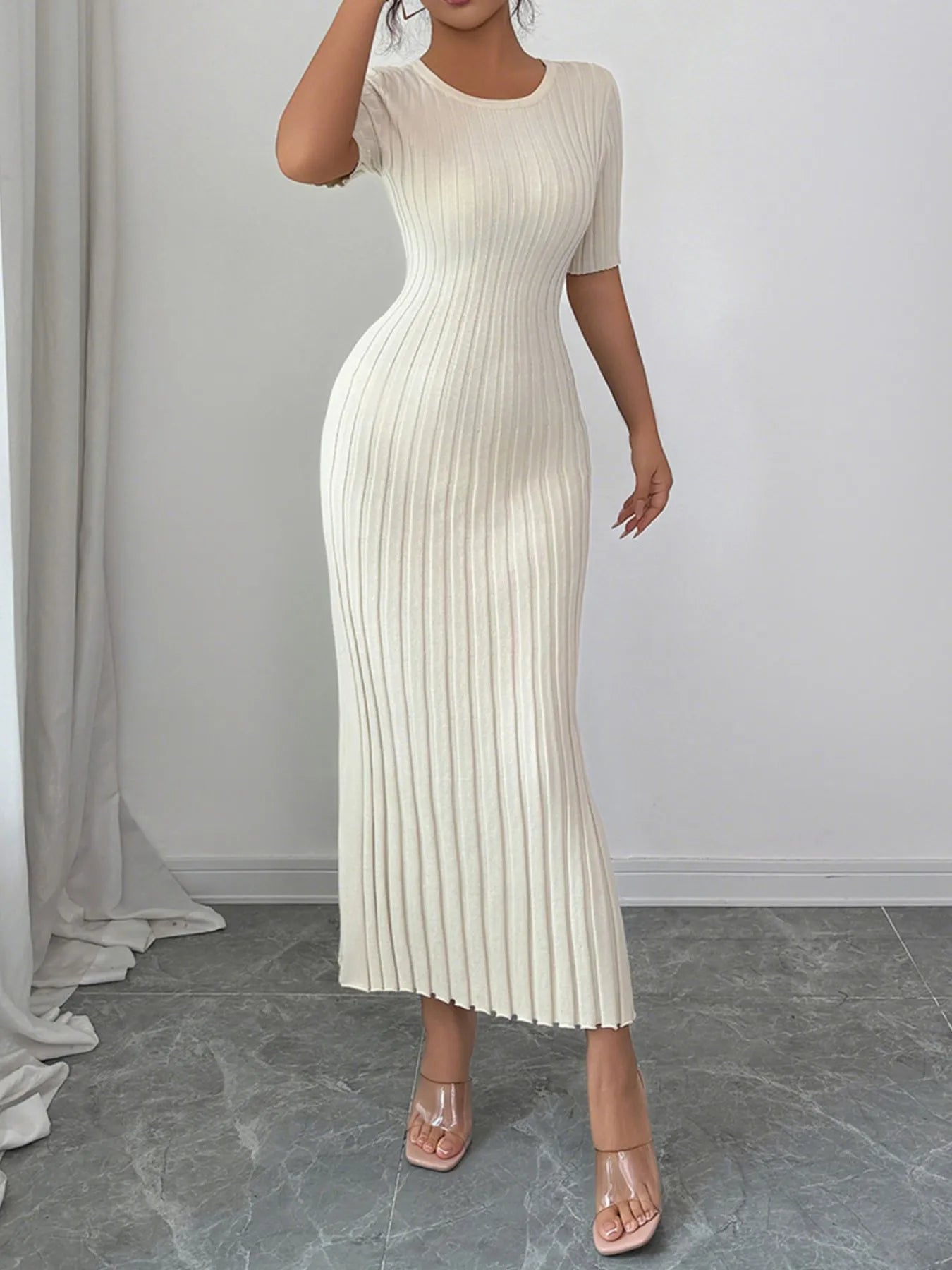 Round Neck Short Sleeve Sweater Dress designed for comfort and style at Lookzlike