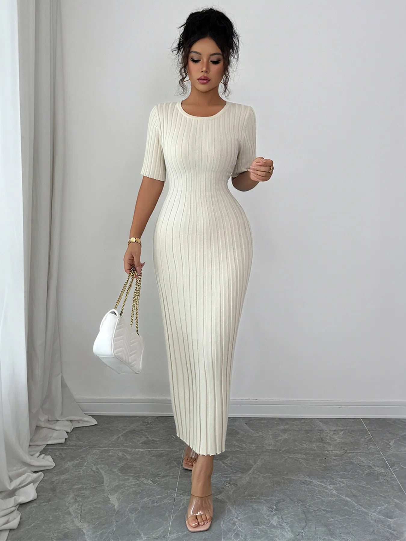 Round Neck Short Sleeve Sweater Dress designed for comfort and style at Lookzlike