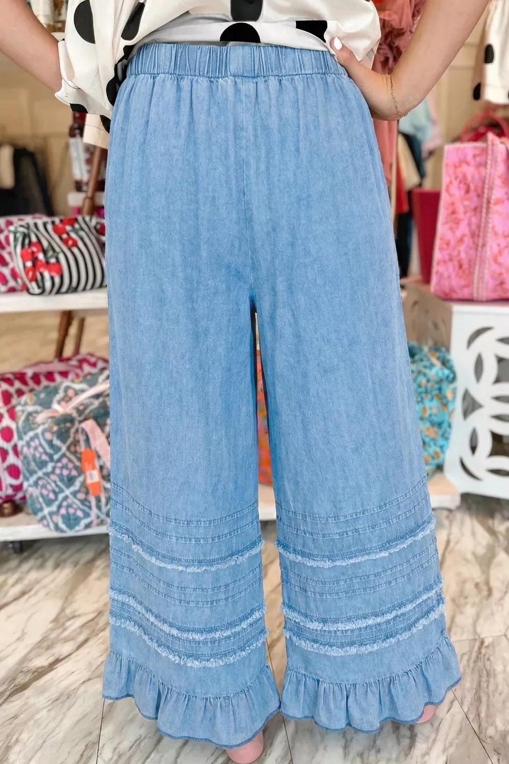 Ruffled Hem Wide Leg Chambray Jeans designed for comfort and style at Lookzlike