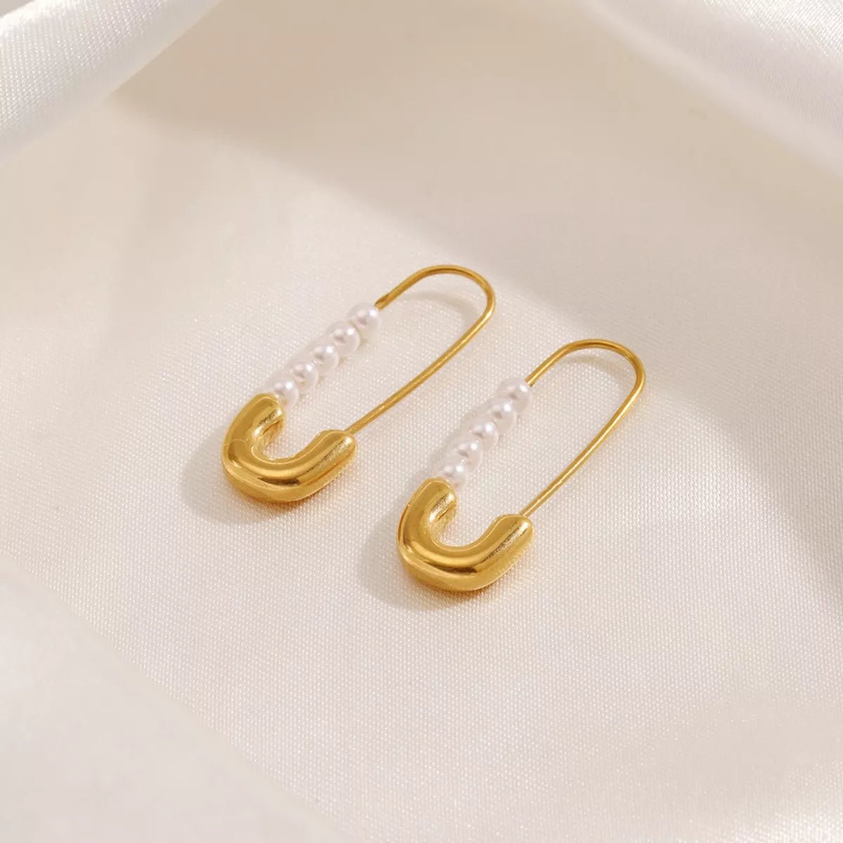 Safety Pin Pearl Accent Earrings designed for comfort and style at Lookzlike