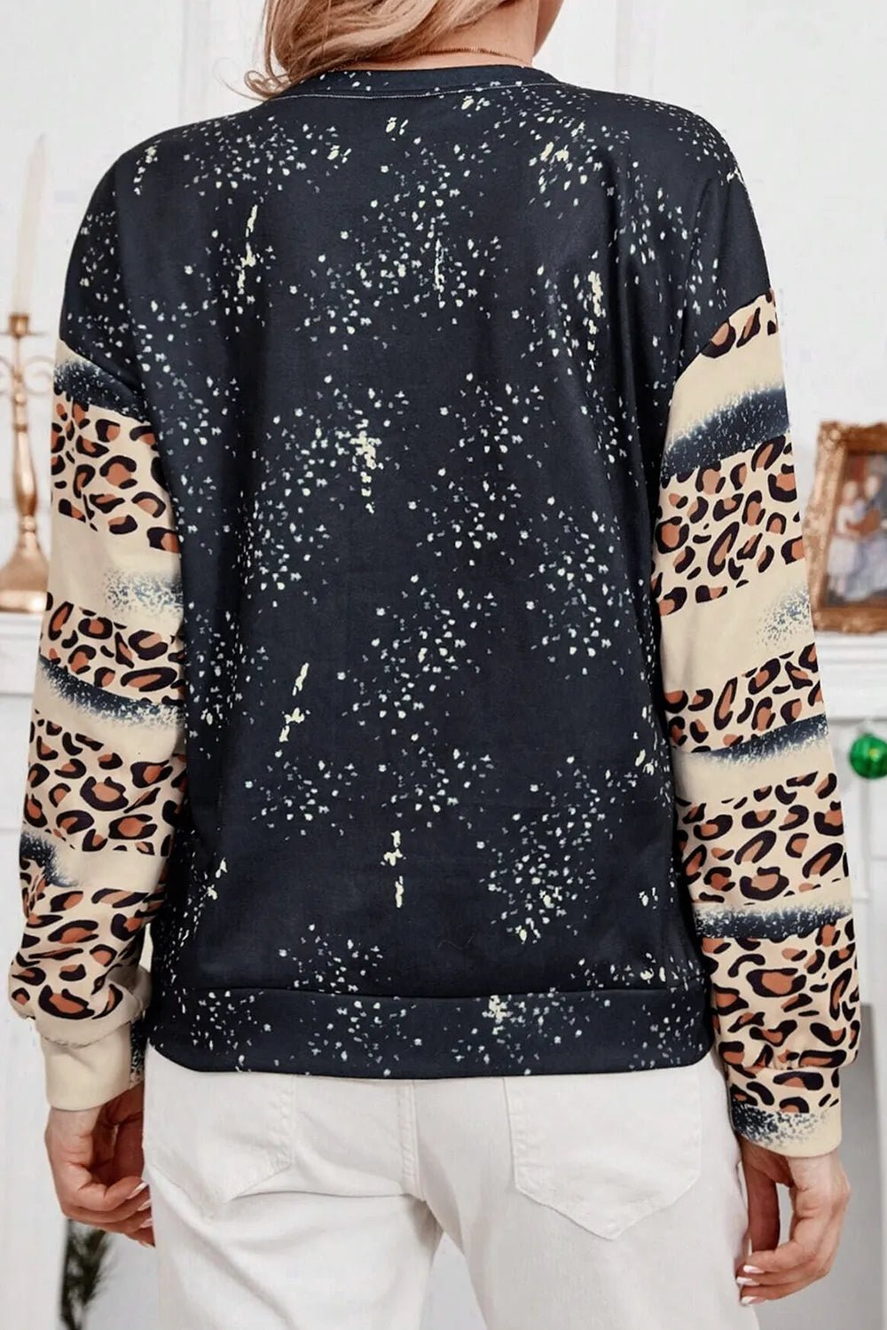 Santa Graphic Leopard Dropped Shoulder Sweatshirt designed for comfort and style at Lookzlike