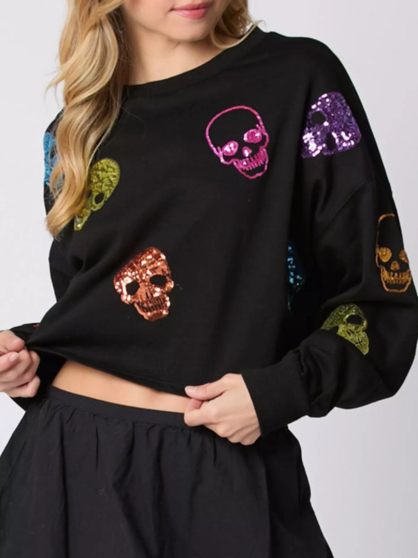 Sequin Skull Long Sleeve Sweatshirt designed for comfort and style at Lookzlike