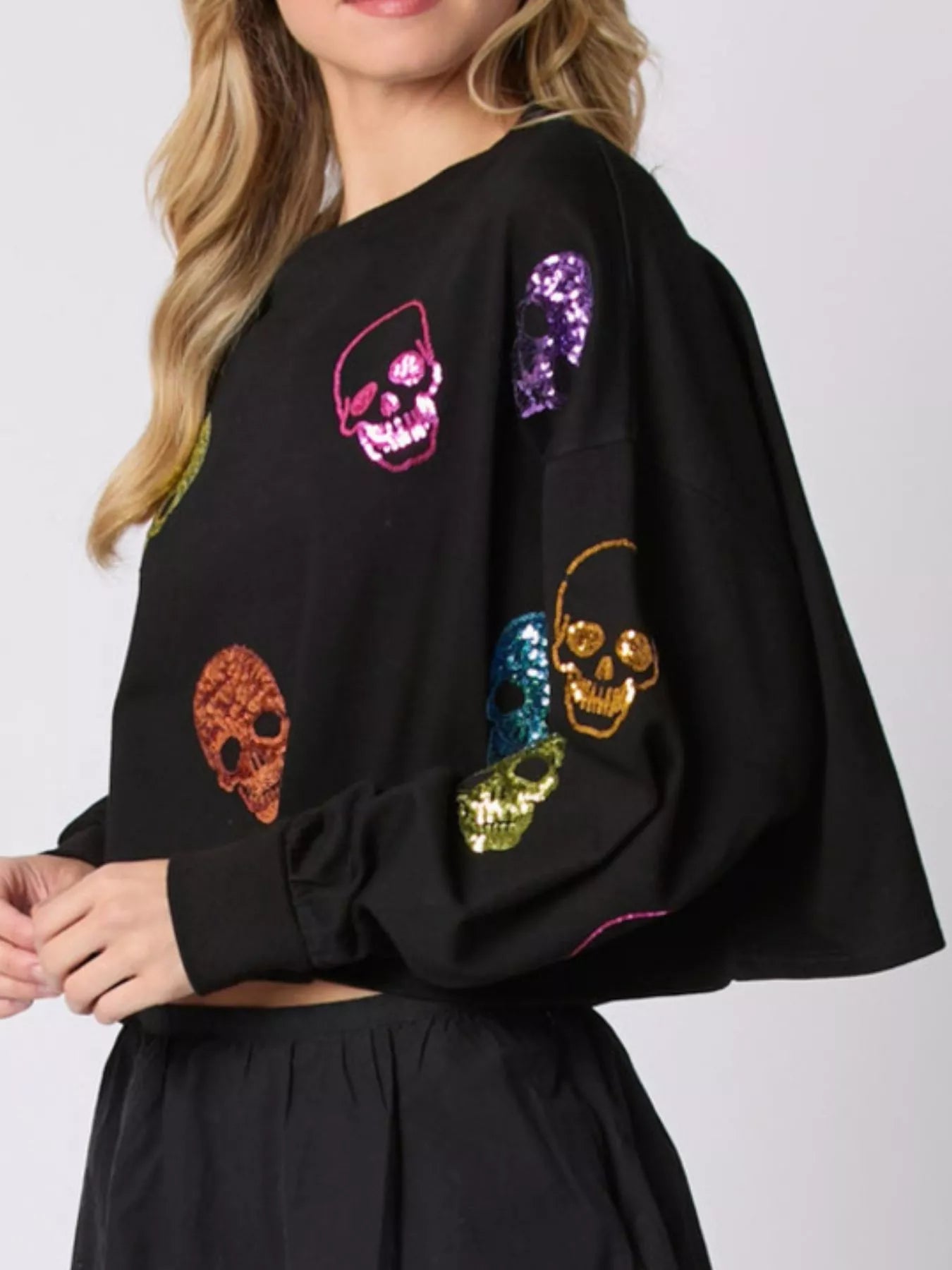 Sequin Skull Long Sleeve Sweatshirt designed for comfort and style at Lookzlike