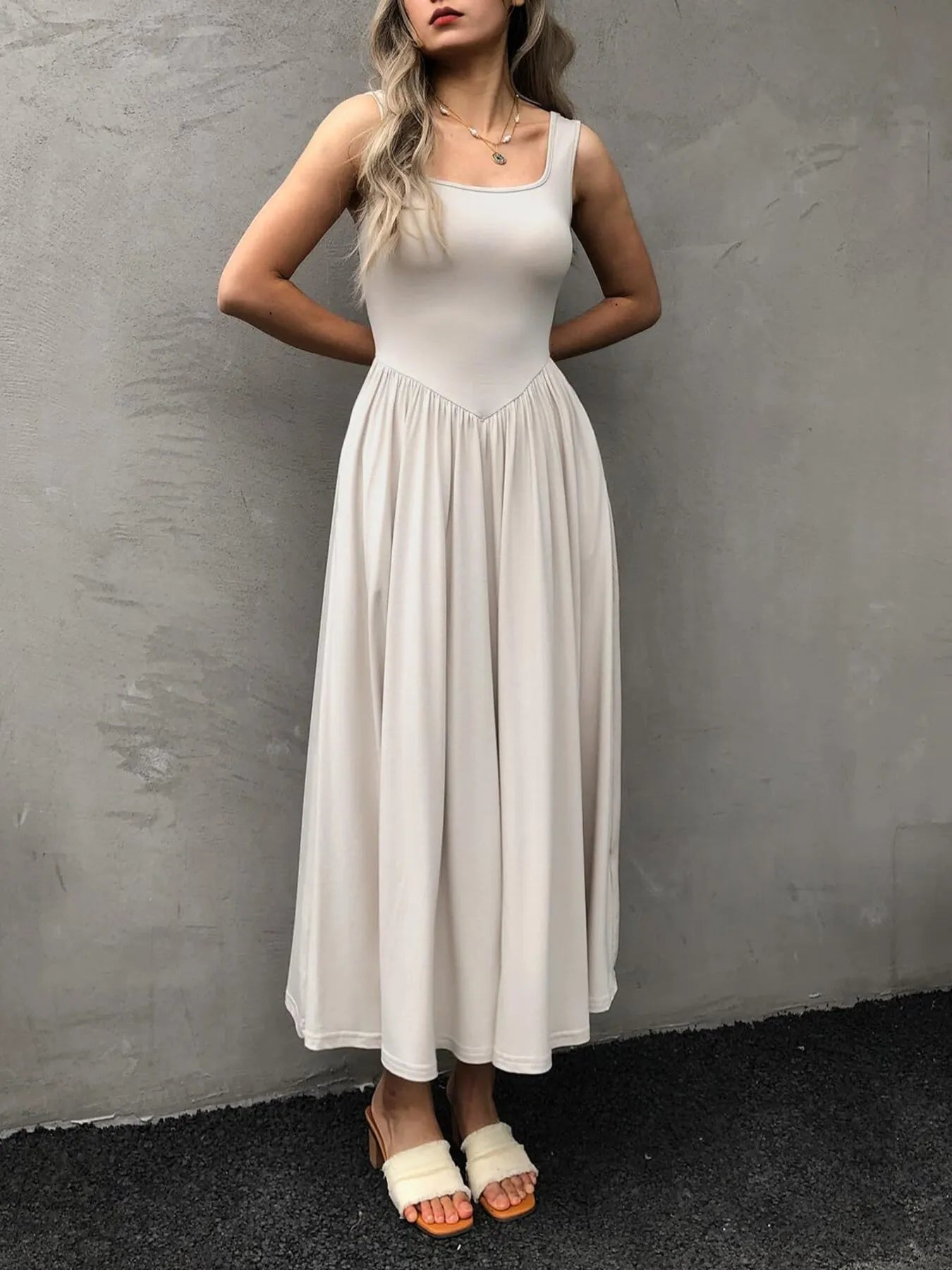 Sleeveless Midi Dress with Gathered Waist designed for comfort and style at Lookzlike