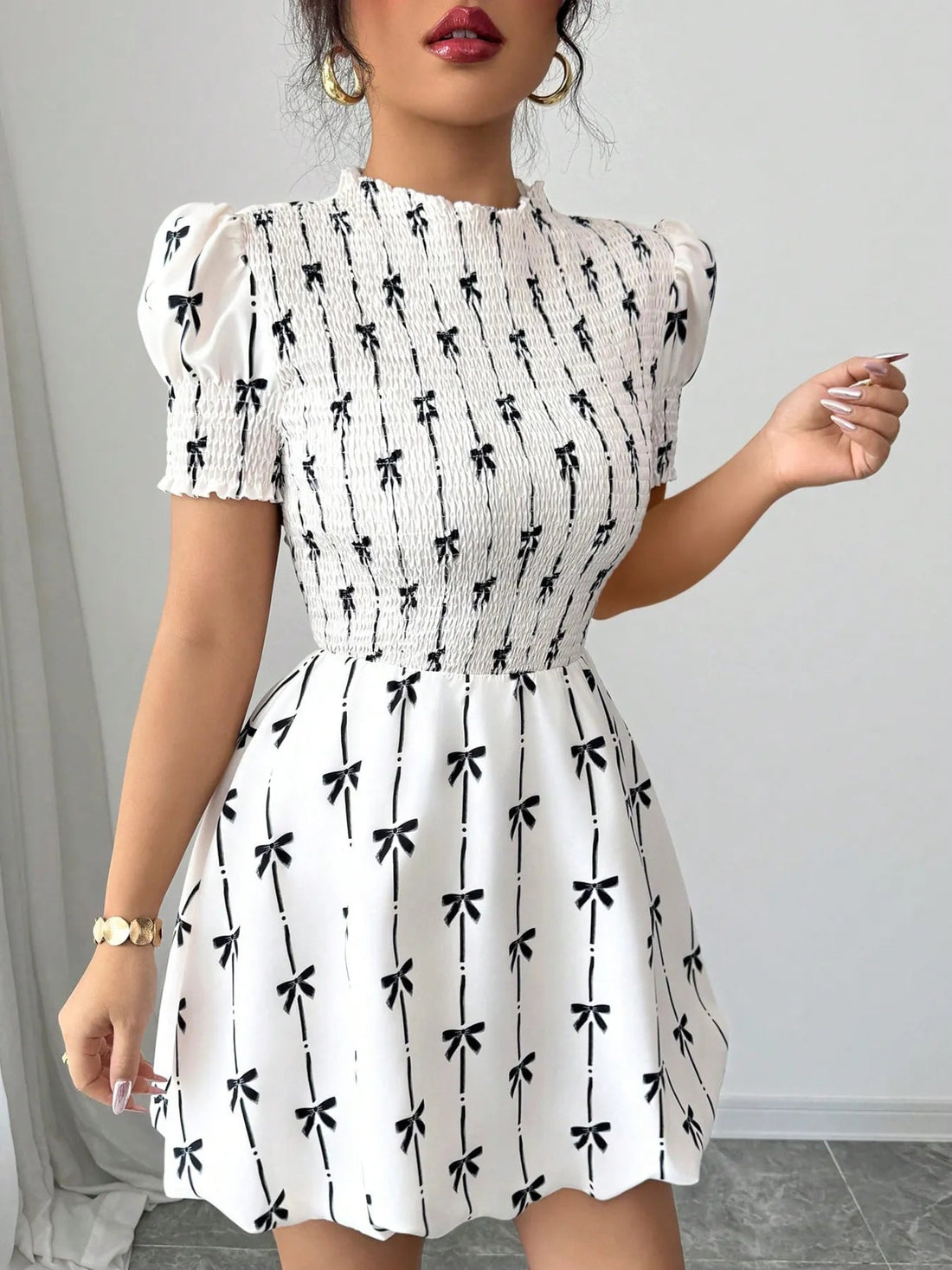 Smocked Bow Print Short Sleeve Dress designed for comfort and style at Lookzlike
