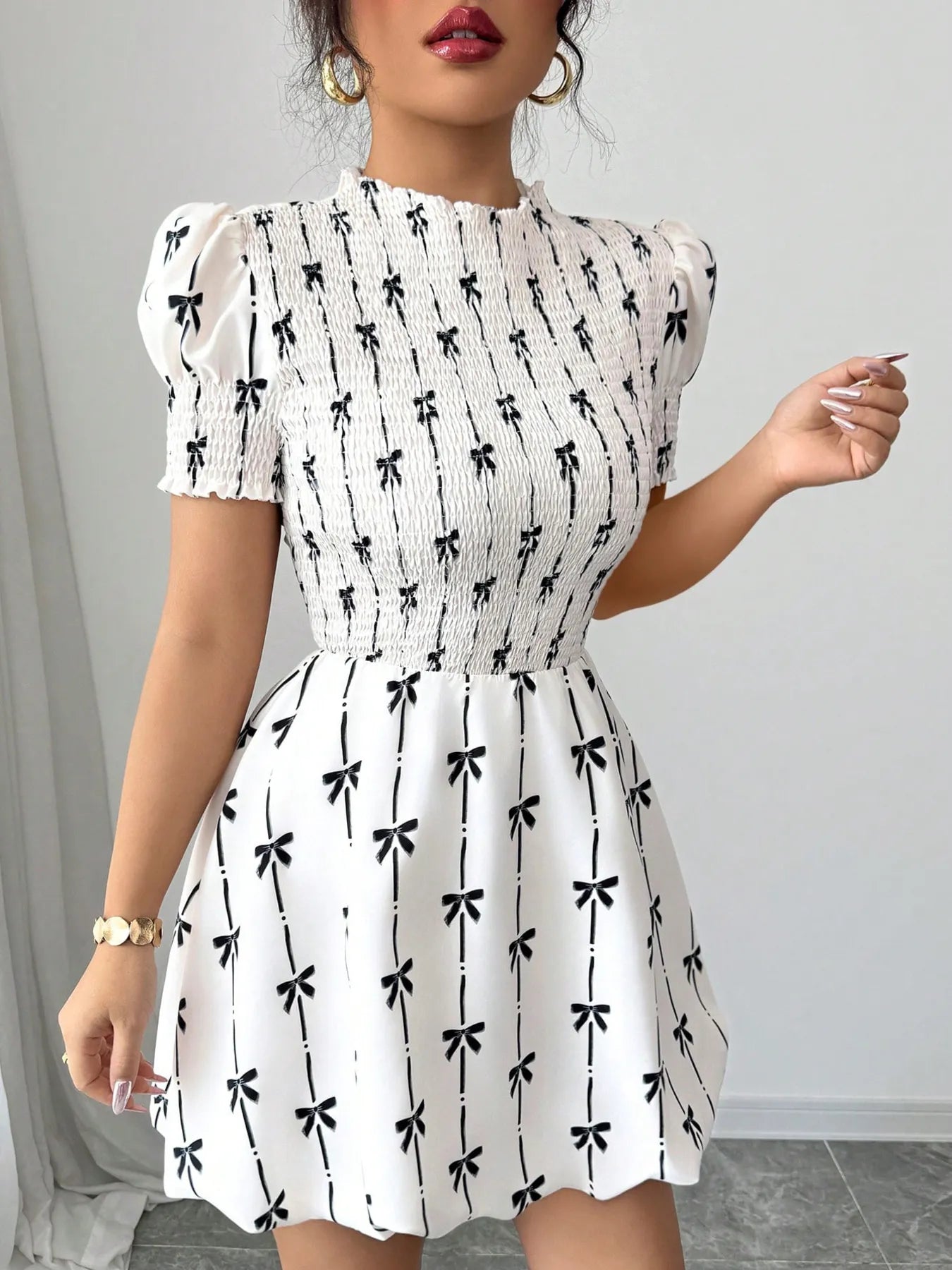 Smocked Bow Print Short Sleeve Dress designed for comfort and style at Lookzlike