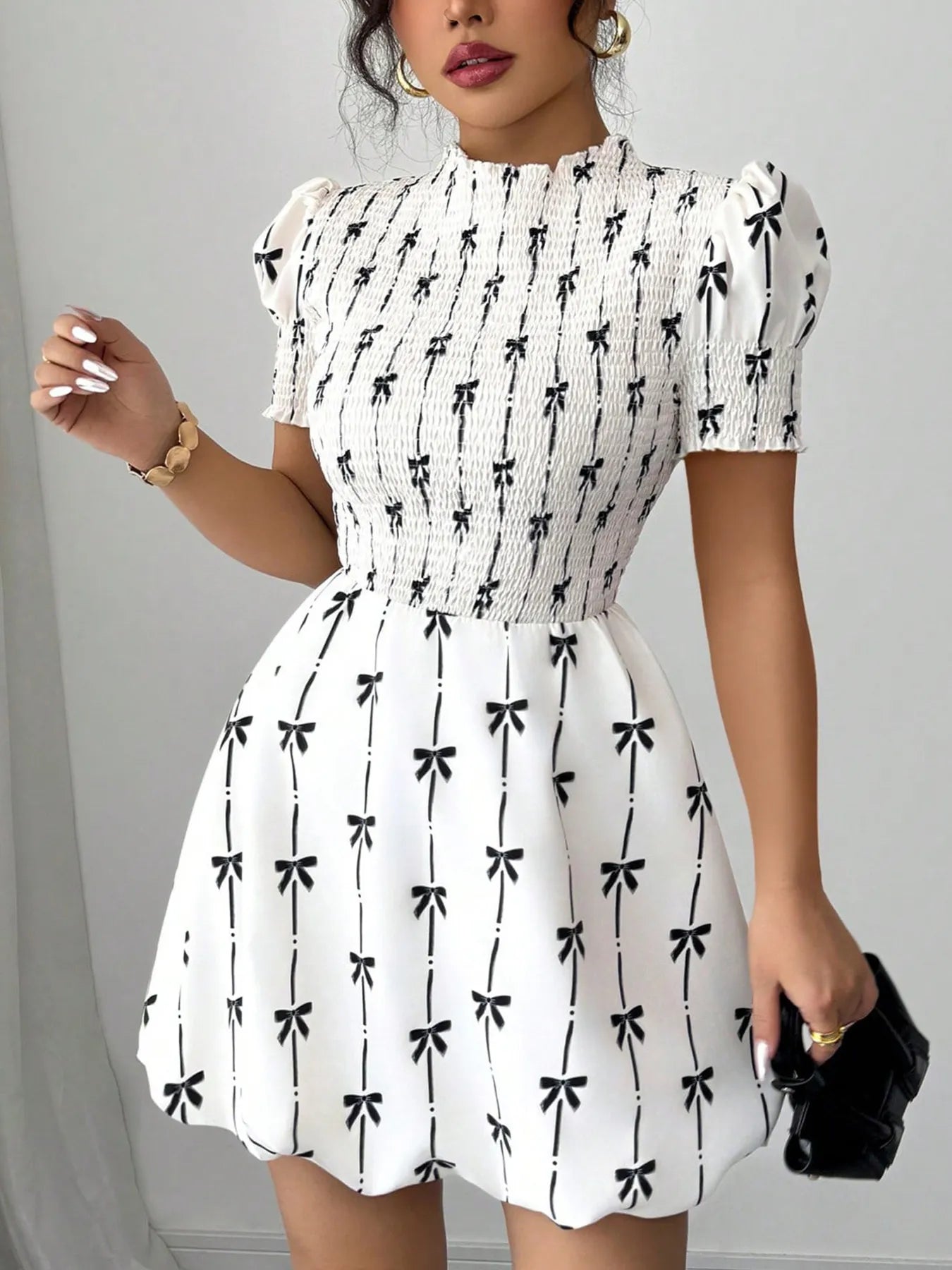Smocked Bow Print Short Sleeve Dress designed for comfort and style at Lookzlike