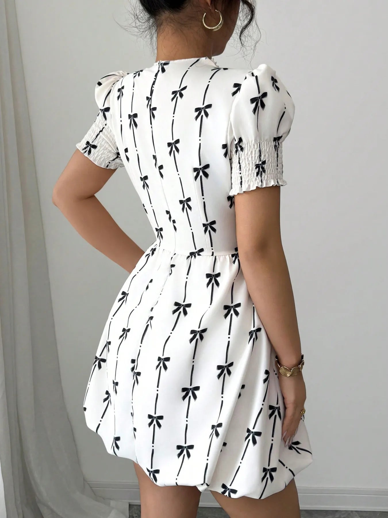 Smocked Bow Print Short Sleeve Dress designed for comfort and style at Lookzlike