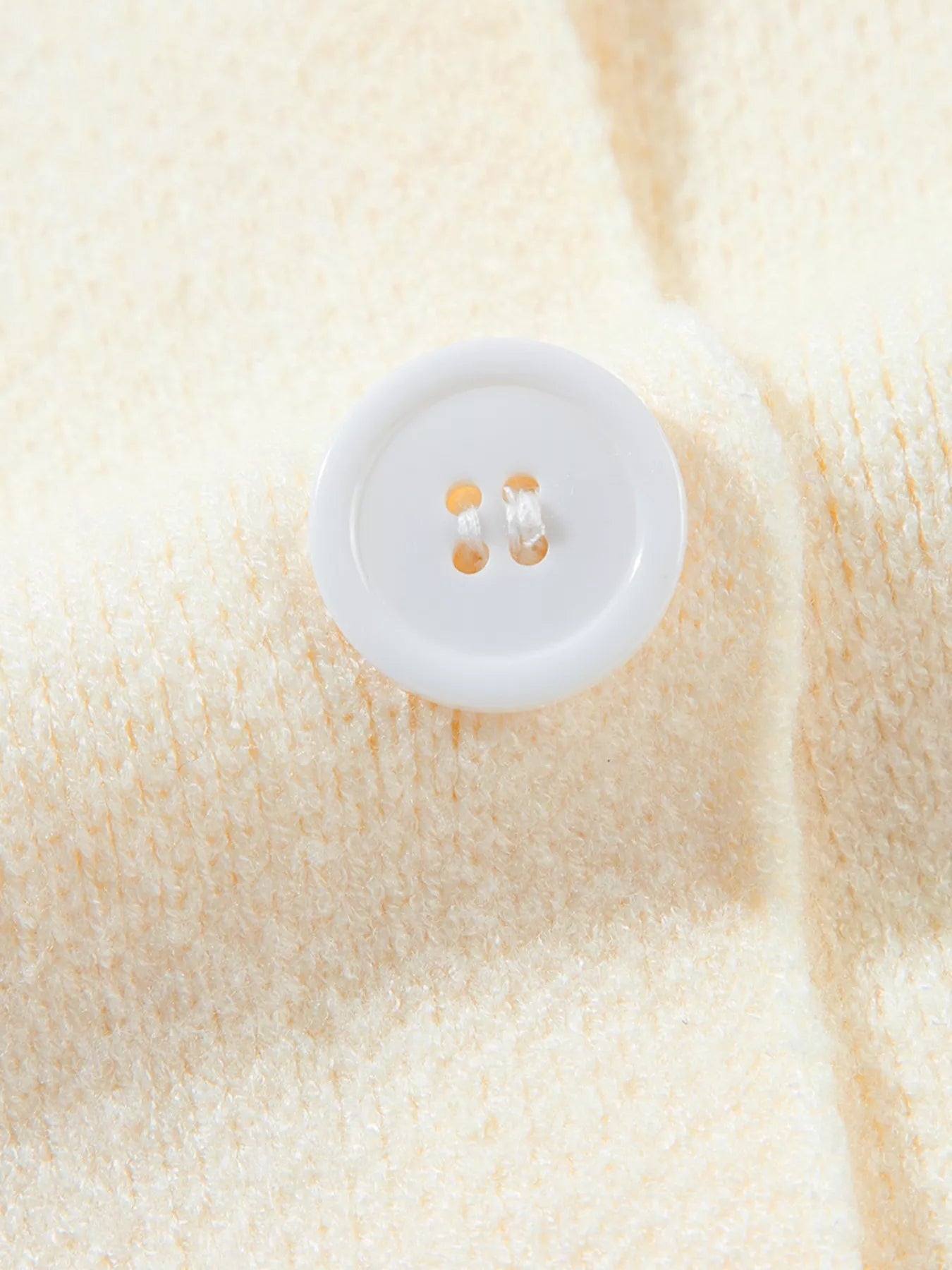 Solid Color Knit Lapel Collar Single Button Sweater Cardigan designed for comfort and style at Lookzlike