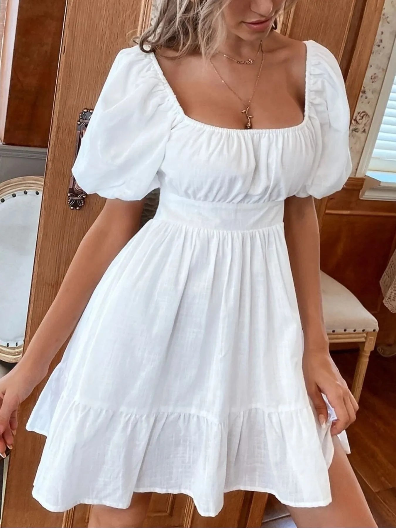 Square Neck Puff Sleeve Mini Dress designed for comfort and style at Lookzlike