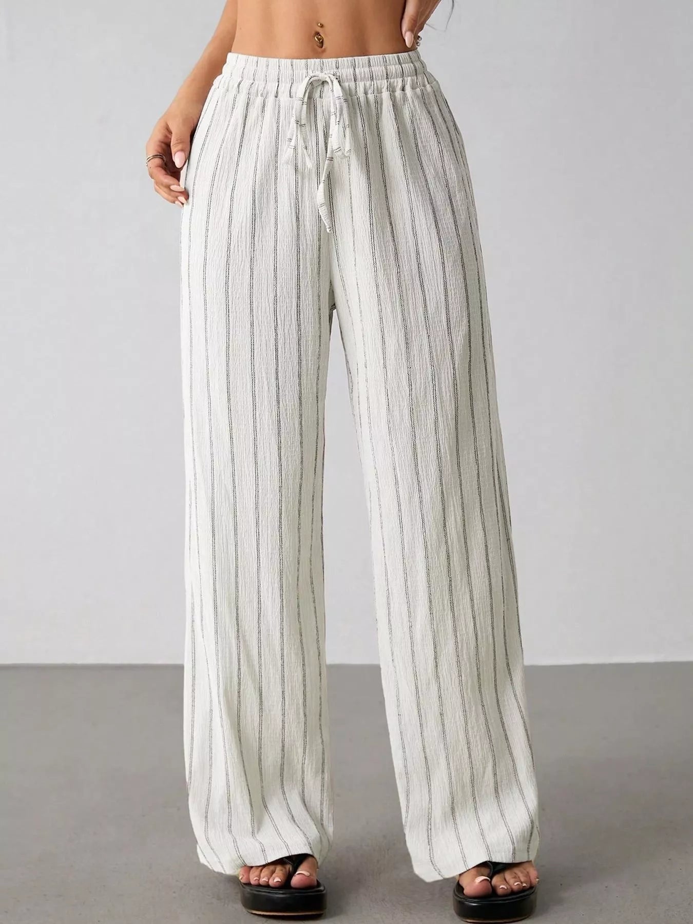 Striped Wide-Leg Drawstring Pants designed for comfort and style at Lookzlike