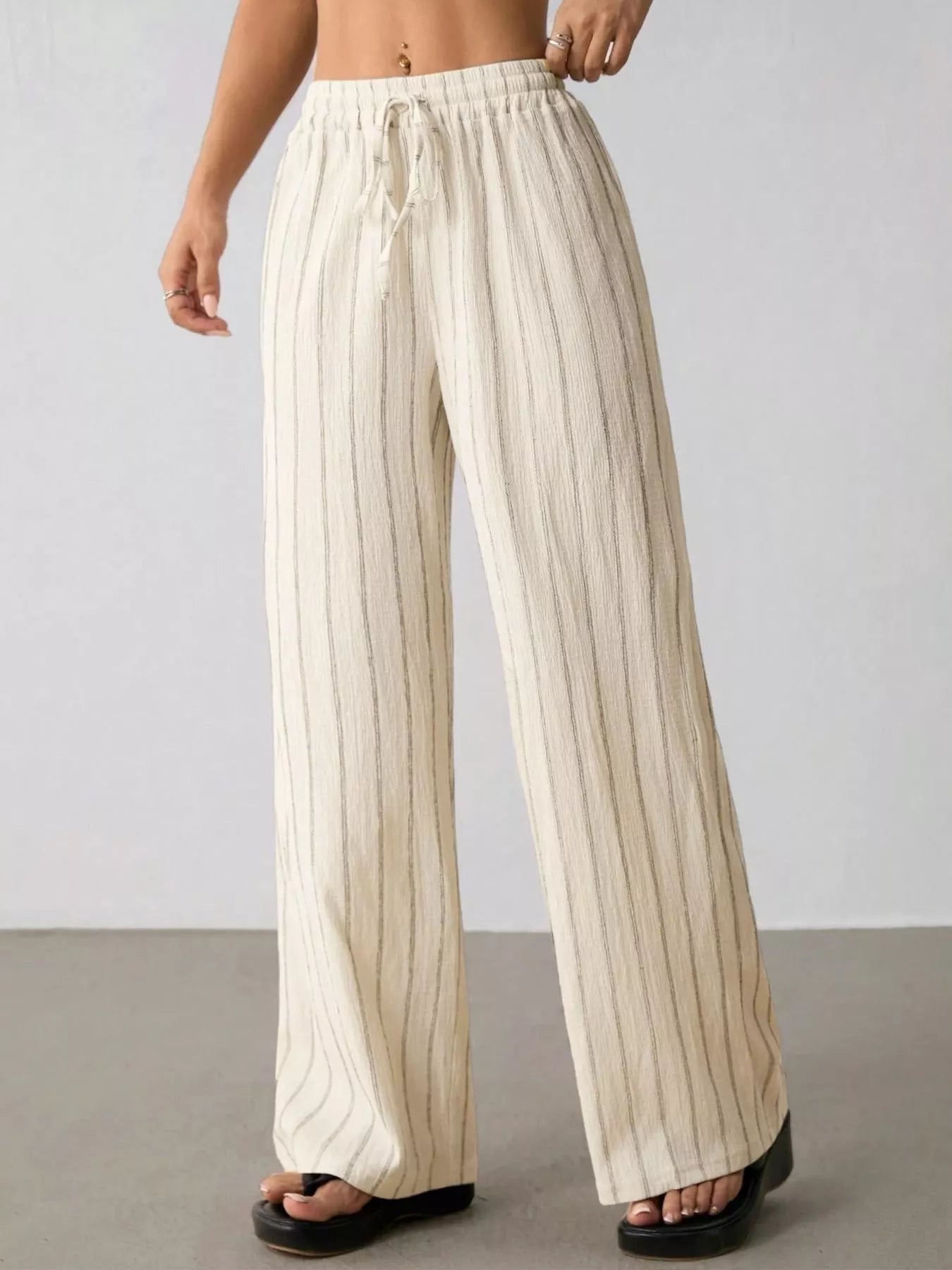 Striped Wide-Leg Drawstring Pants designed for comfort and style at Lookzlike