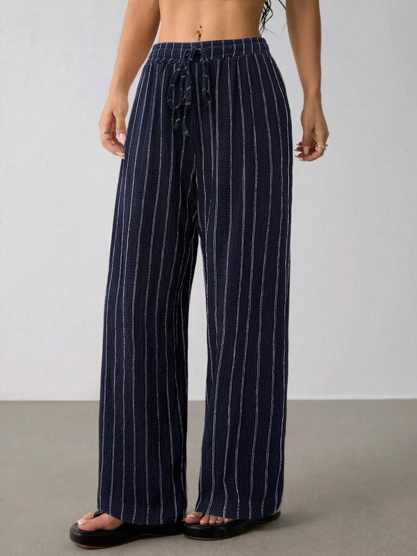 Striped Wide-Leg Drawstring Pants designed for comfort and style at Lookzlike