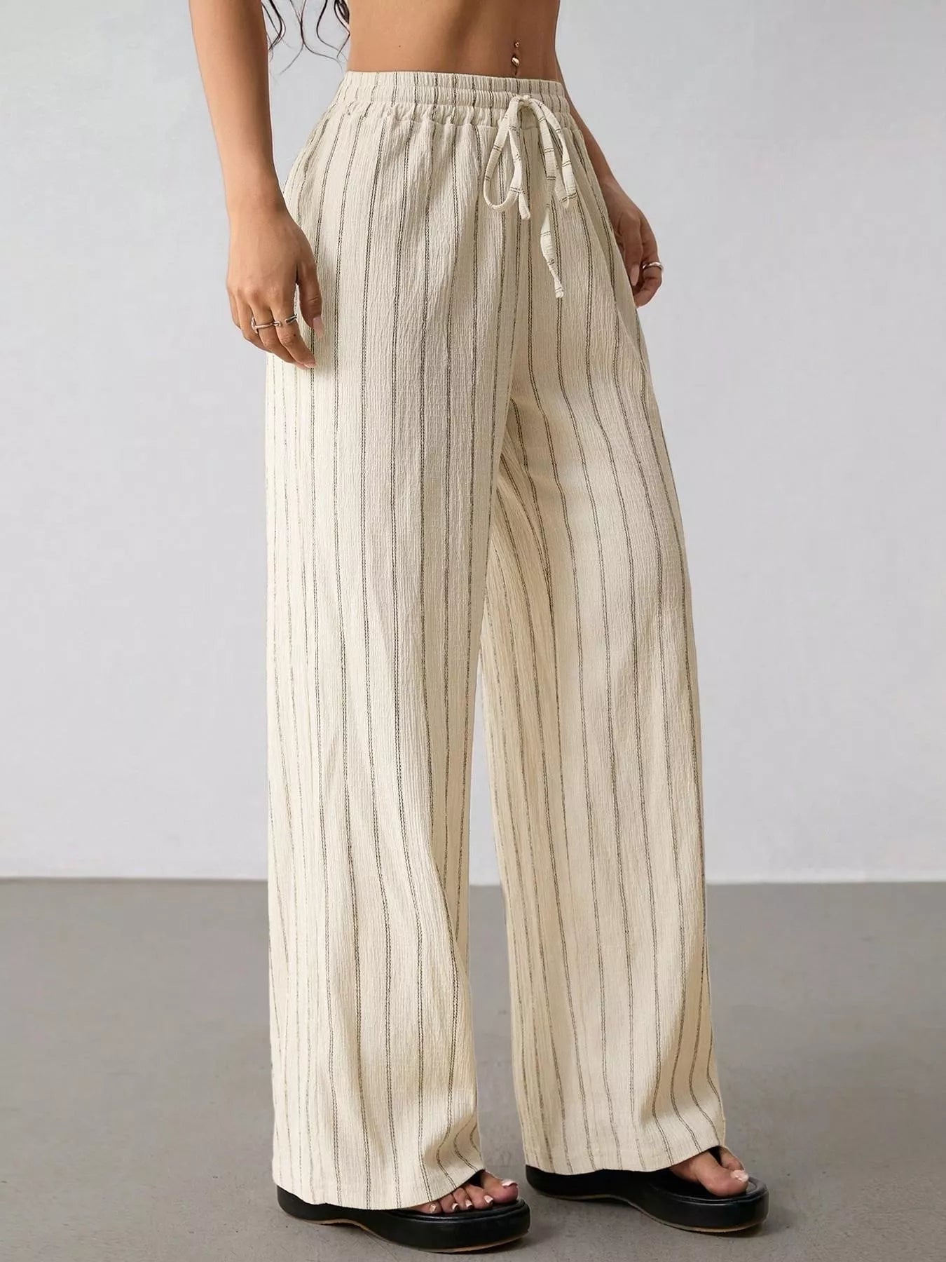 Striped Wide-Leg Drawstring Pants designed for comfort and style at Lookzlike
