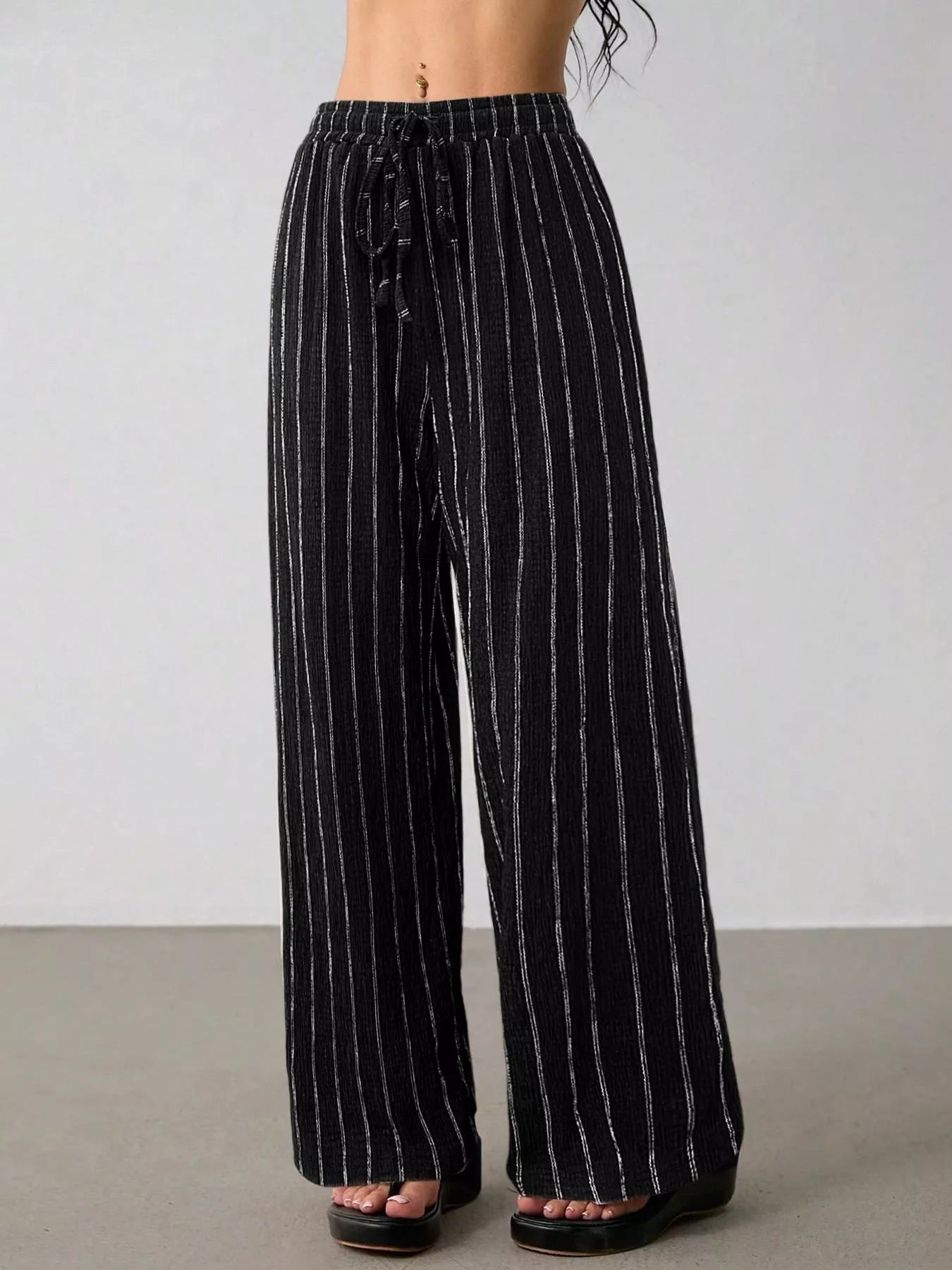 Striped Wide-Leg Drawstring Pants designed for comfort and style at Lookzlike
