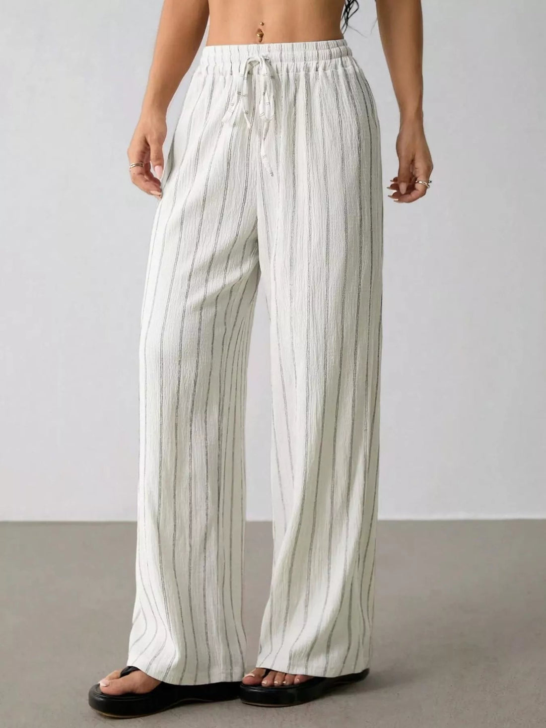 Striped Wide-Leg Drawstring Pants designed for comfort and style at Lookzlike