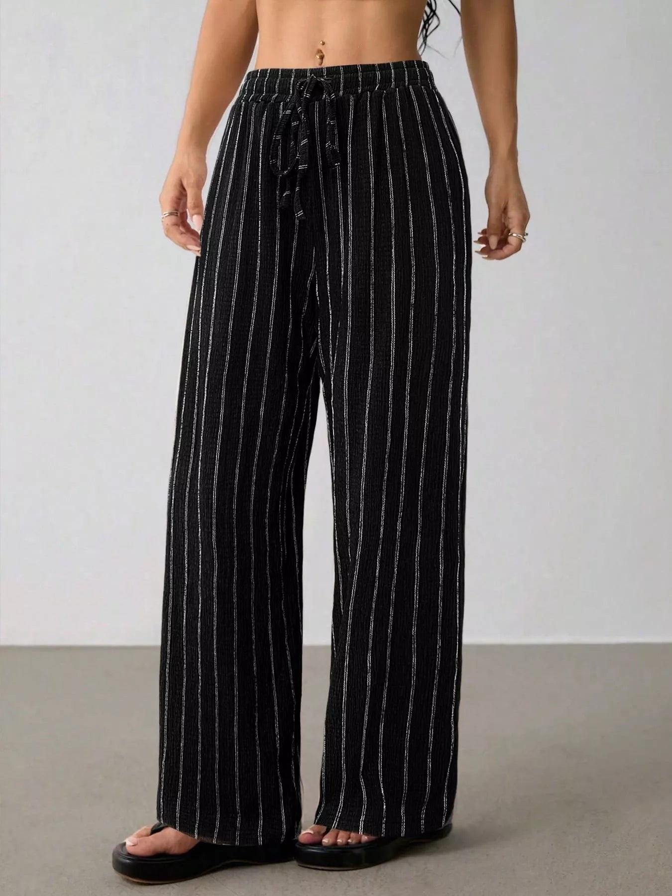 Striped Wide-Leg Drawstring Pants designed for comfort and style at Lookzlike