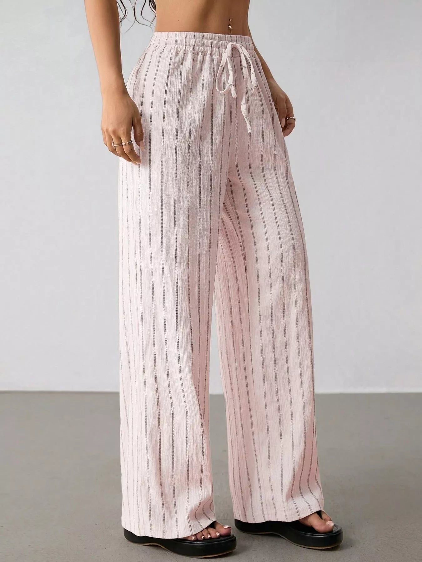 Striped Wide-Leg Drawstring Pants designed for comfort and style at Lookzlike