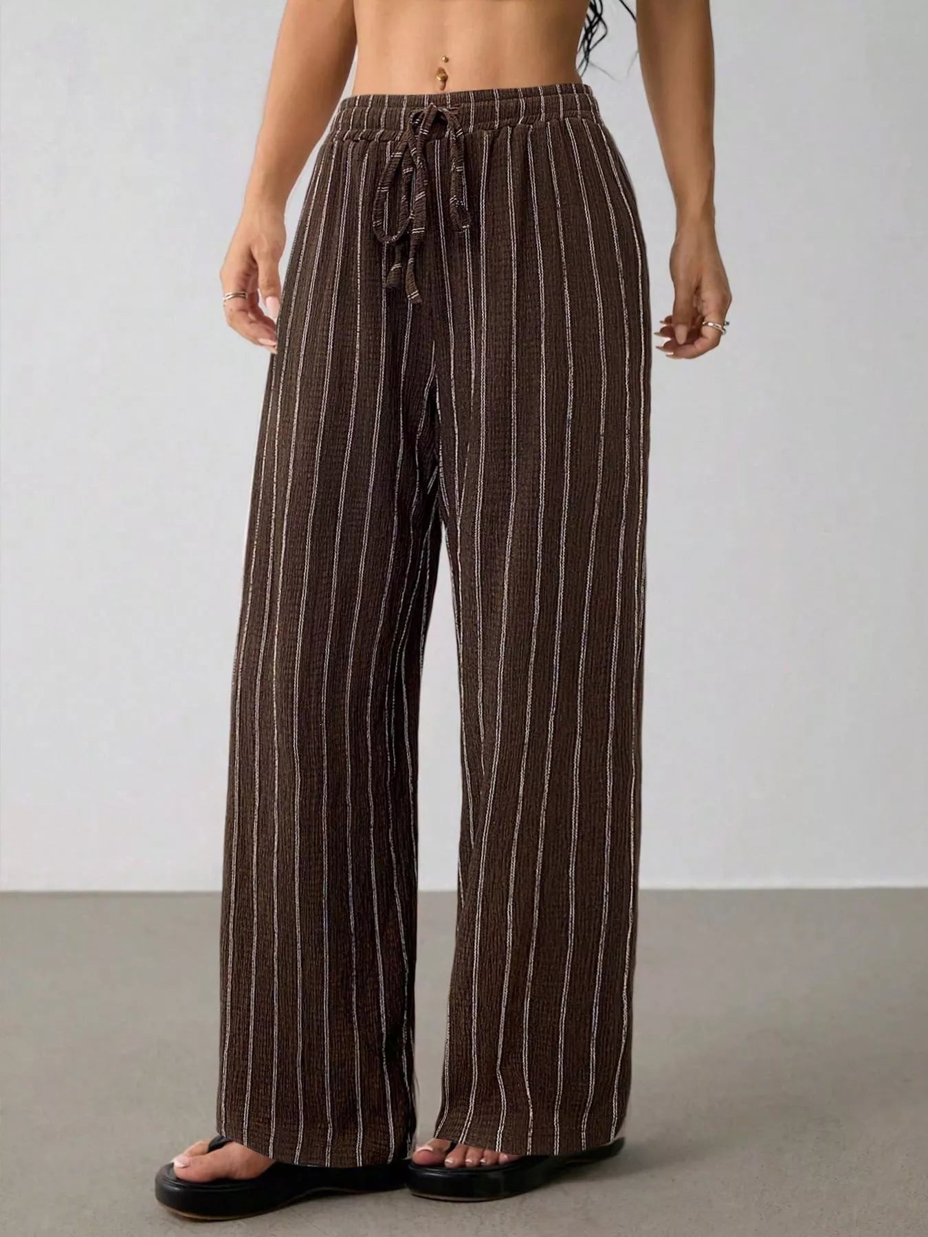 Striped Wide-Leg Drawstring Pants designed for comfort and style at Lookzlike