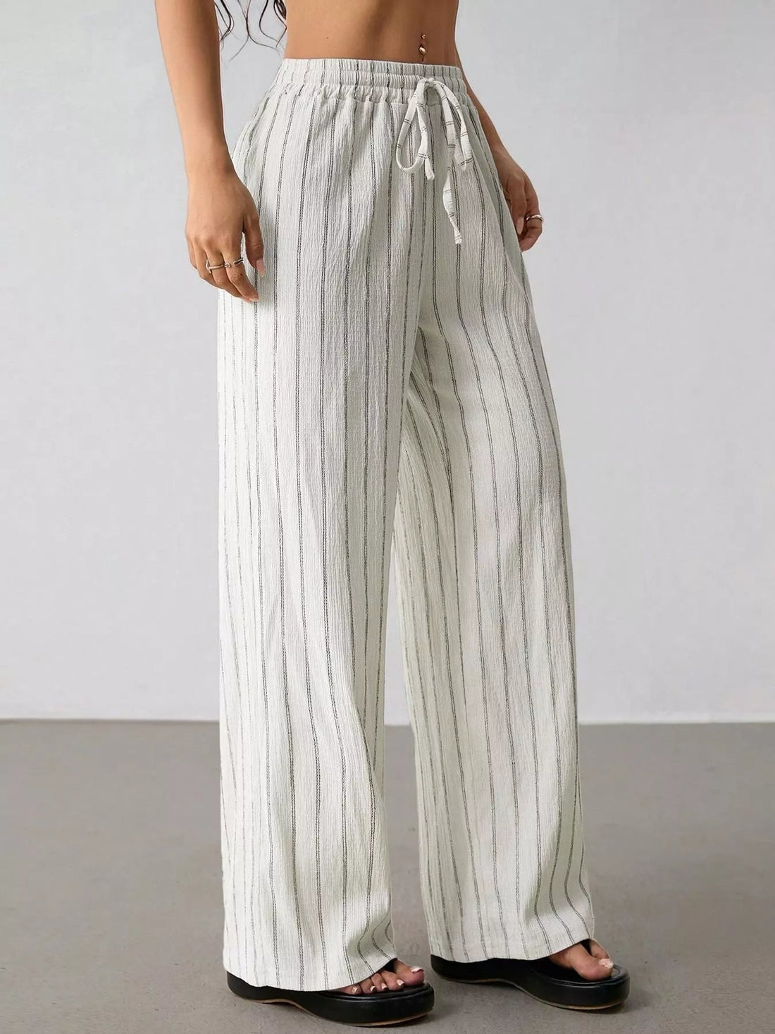 Striped Wide-Leg Drawstring Pants designed for comfort and style at Lookzlike