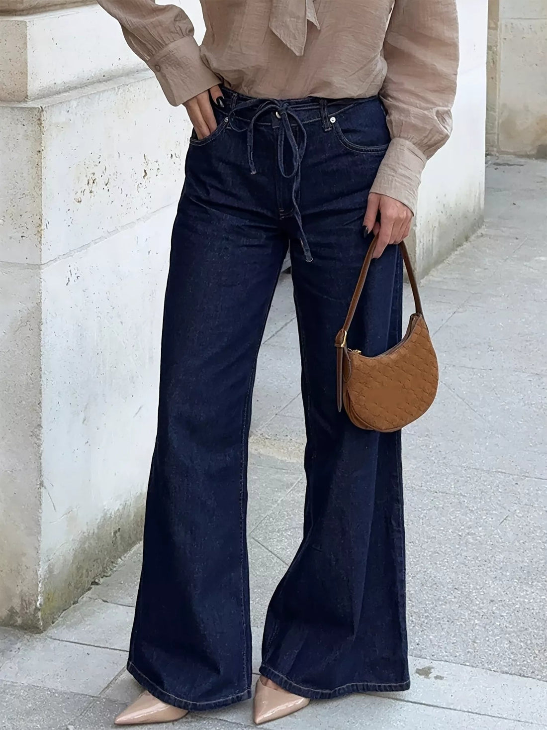 Tied Loose Fit Flare Jeans designed for comfort and style at Lookzlike