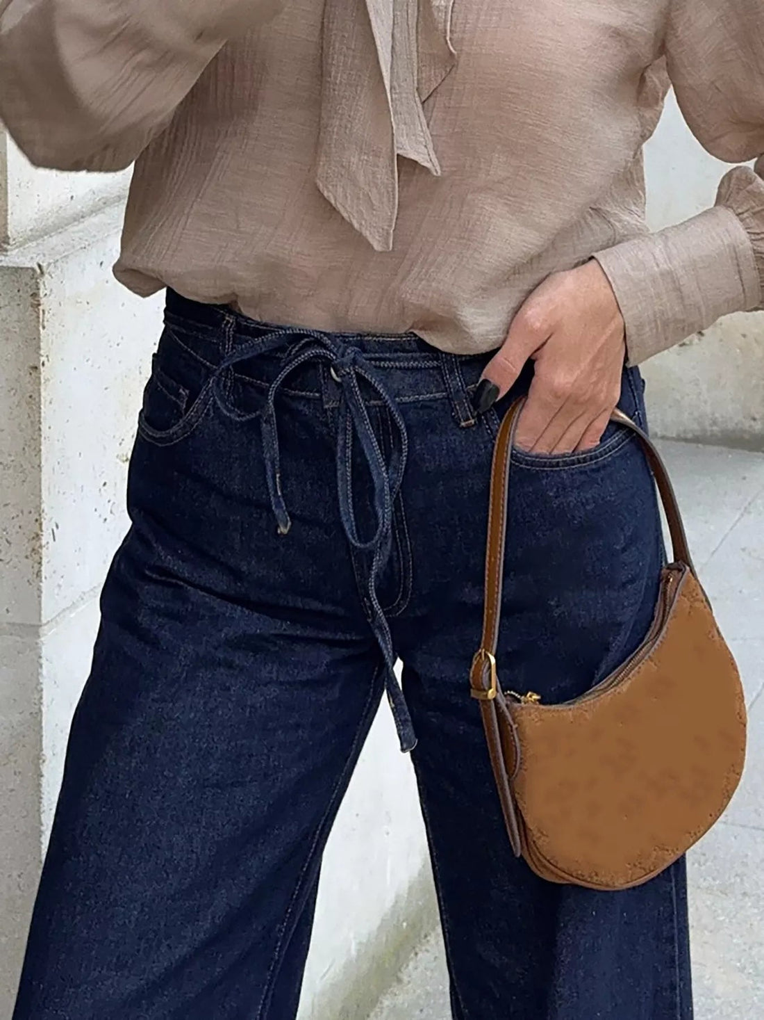 Tied Loose Fit Flare Jeans designed for comfort and style at Lookzlike