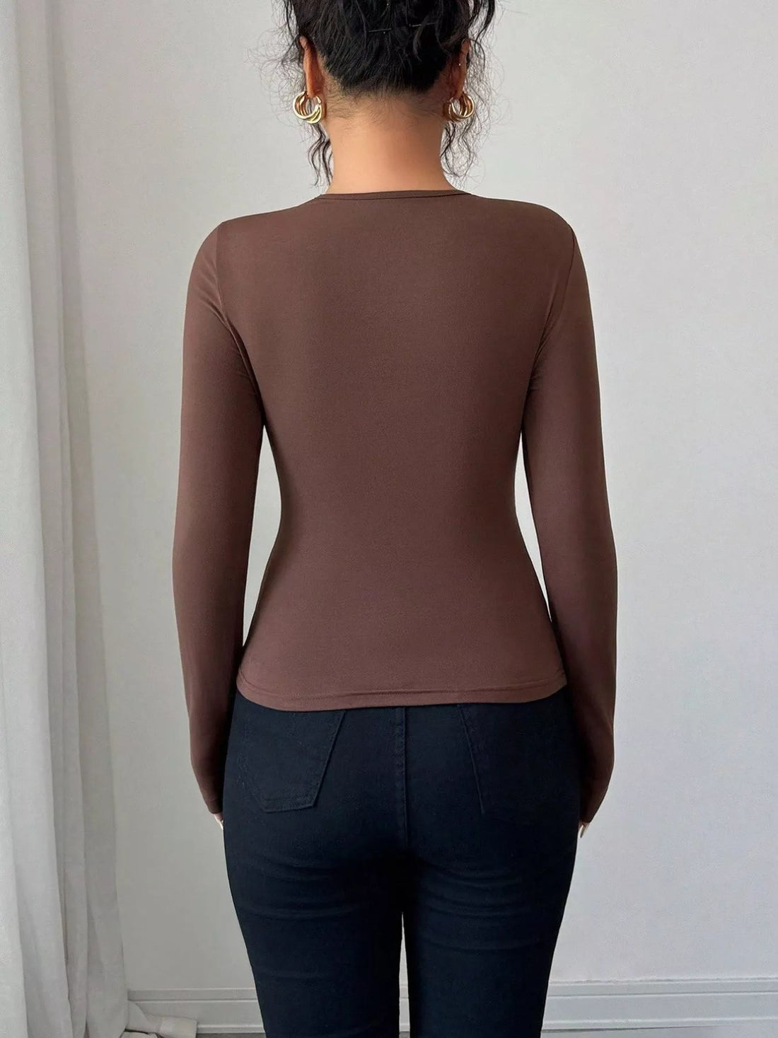 Twist Front Ring Detail Long Sleeve T-Shirt designed for comfort and style at Lookzlike