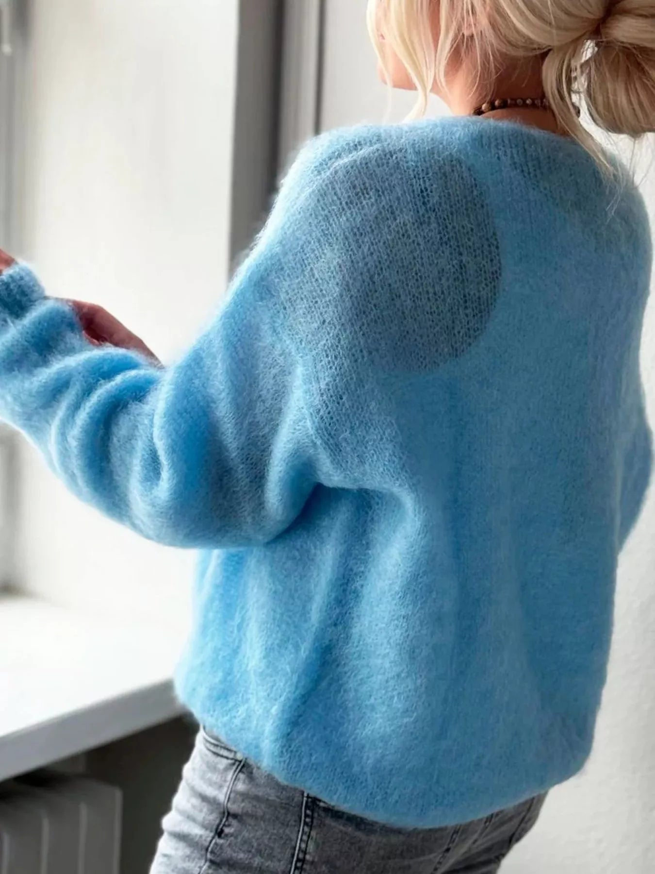 V - Neck Dropped Shoulder Sweater designed for comfort and style at Lookzlike