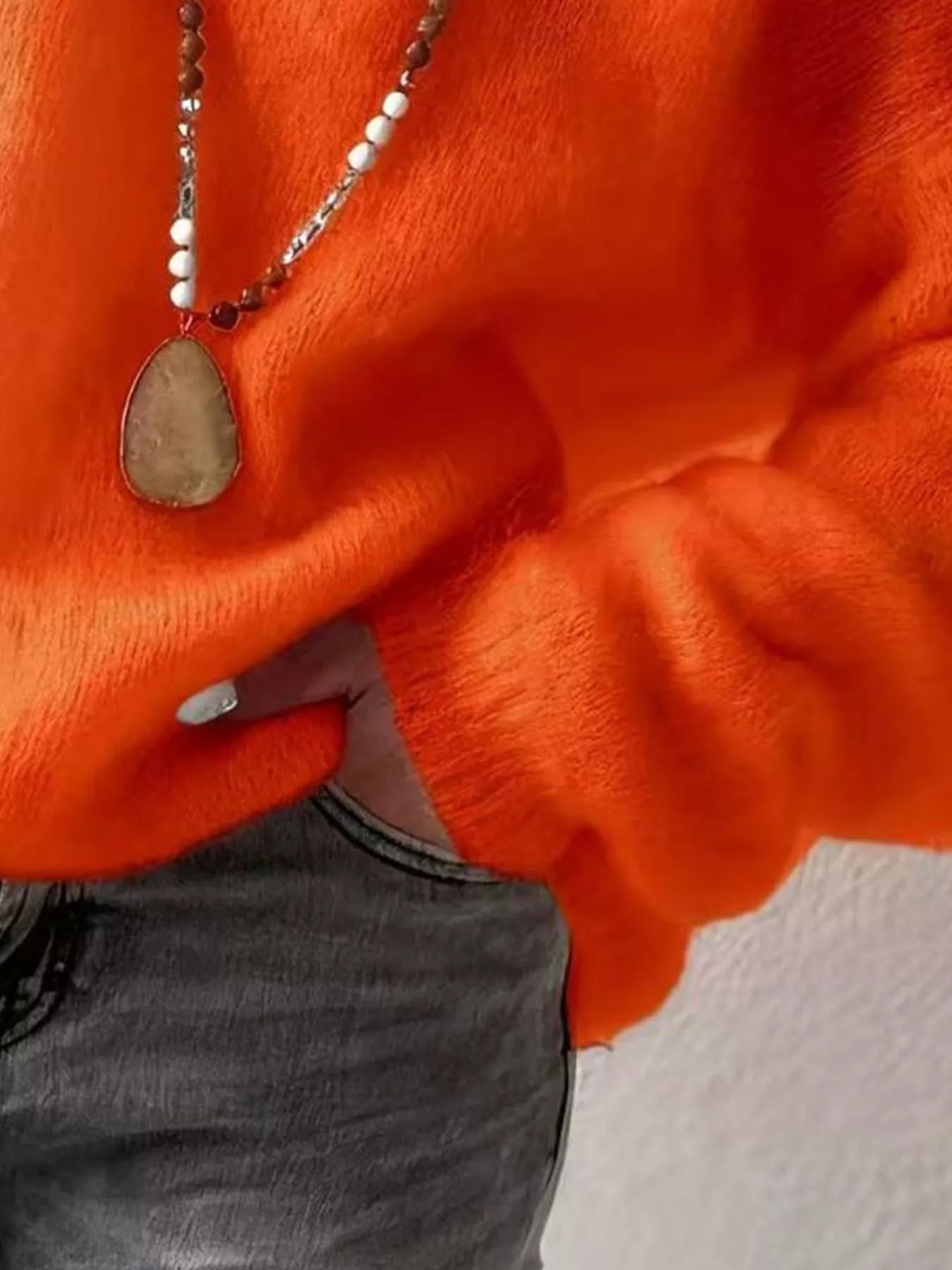 V - Neck Dropped Shoulder Sweater designed for comfort and style at Lookzlike