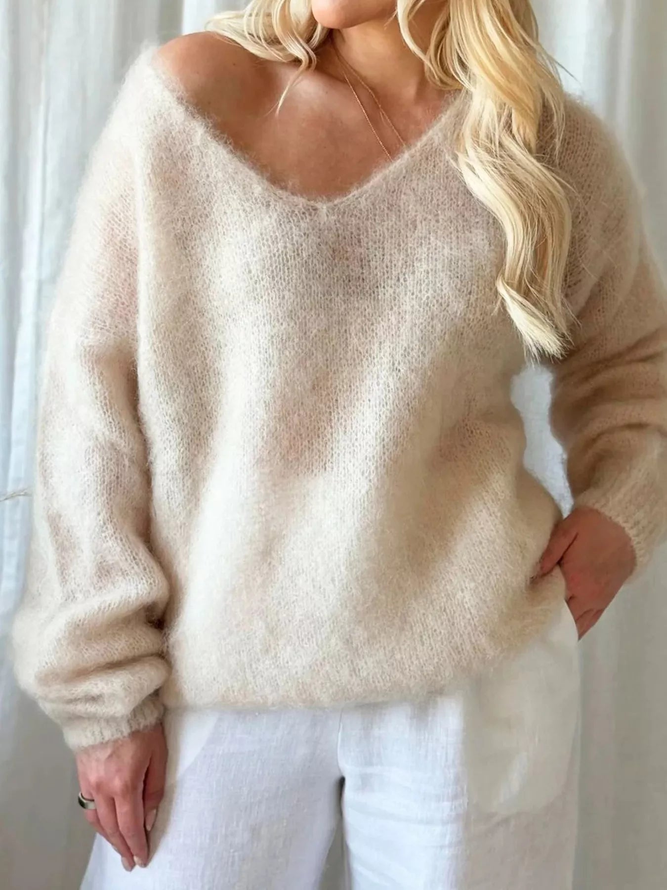 V - Neck Dropped Shoulder Sweater designed for comfort and style at Lookzlike
