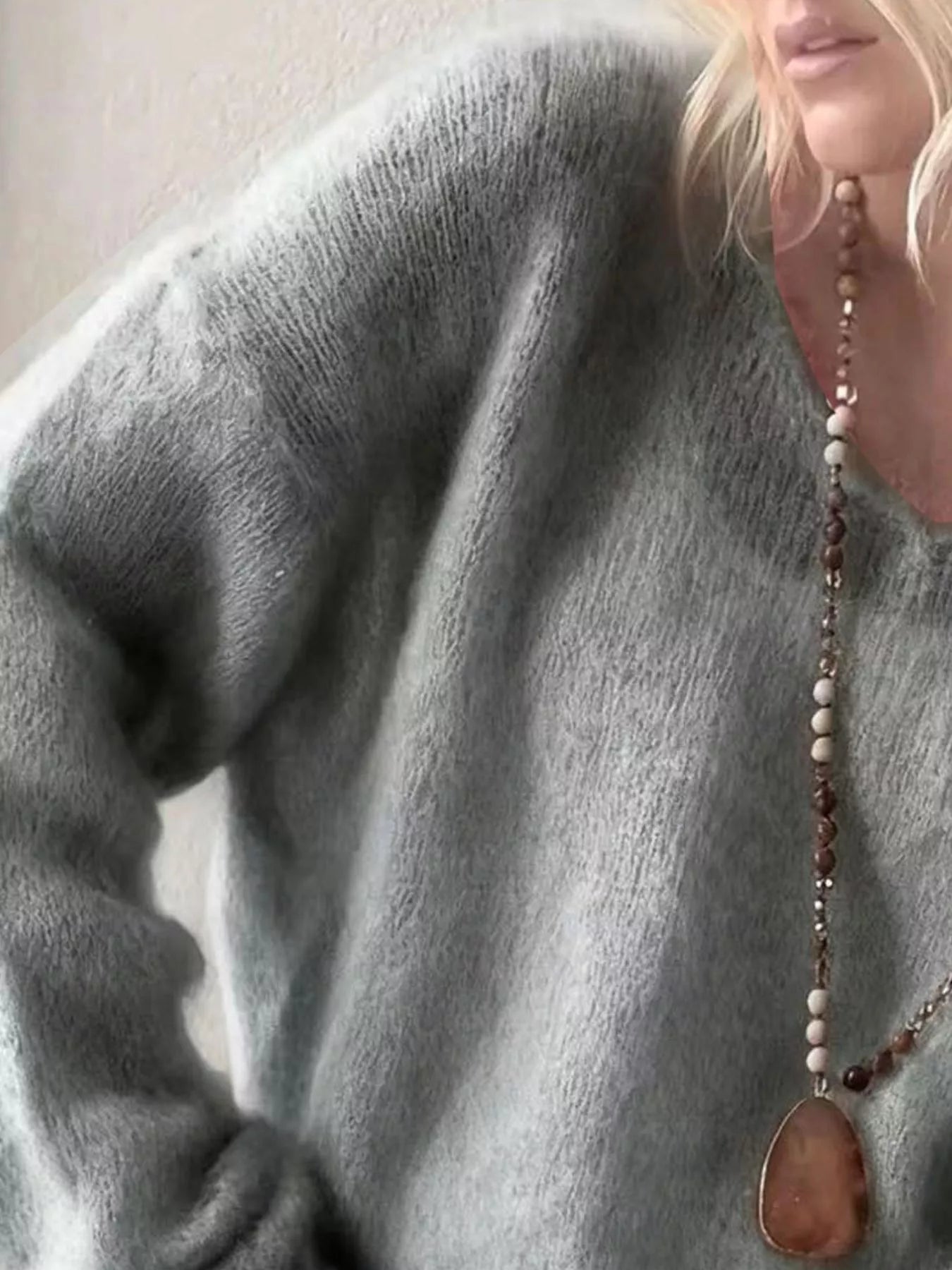 V - Neck Dropped Shoulder Sweater designed for comfort and style at Lookzlike