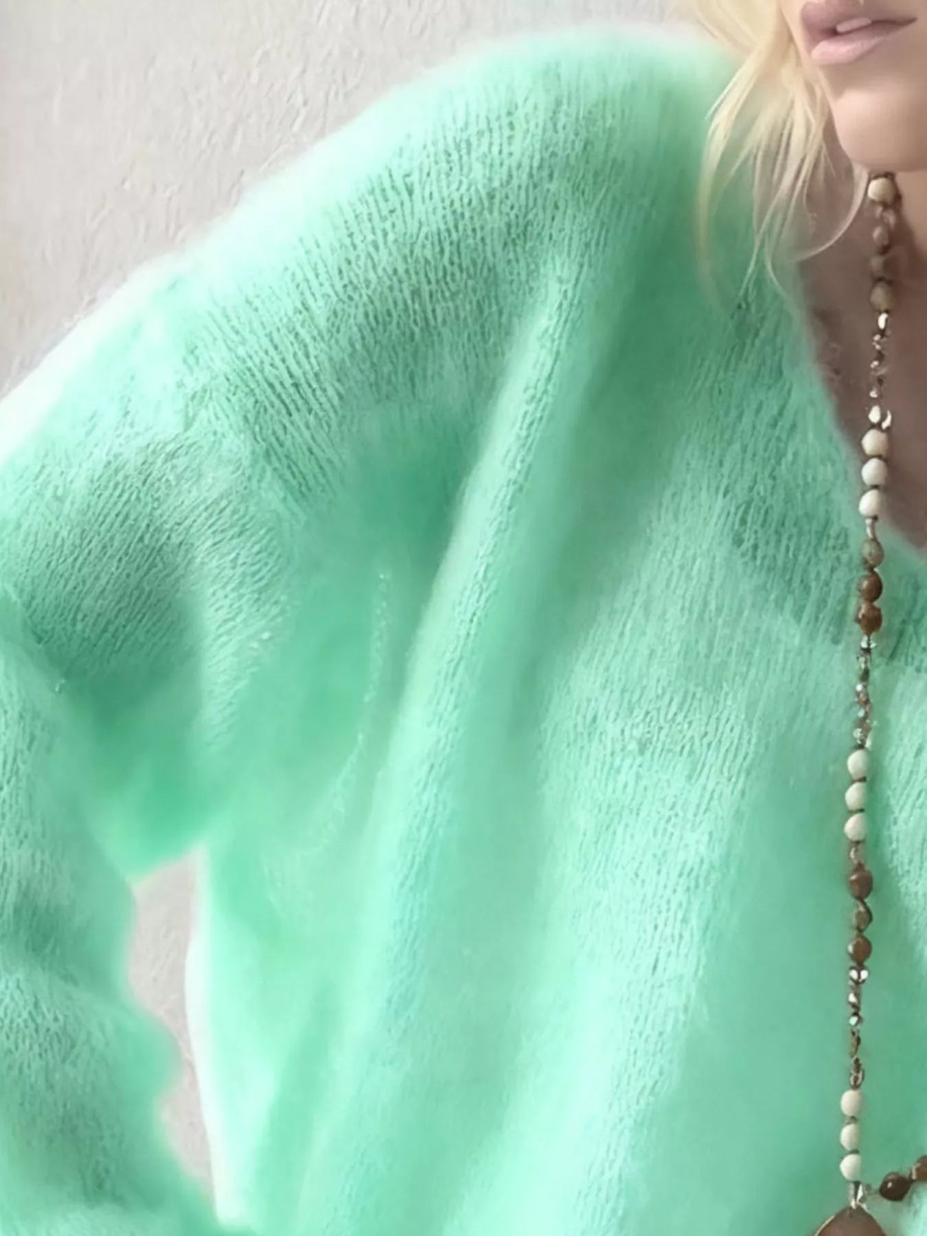 V - Neck Dropped Shoulder Sweater designed for comfort and style at Lookzlike