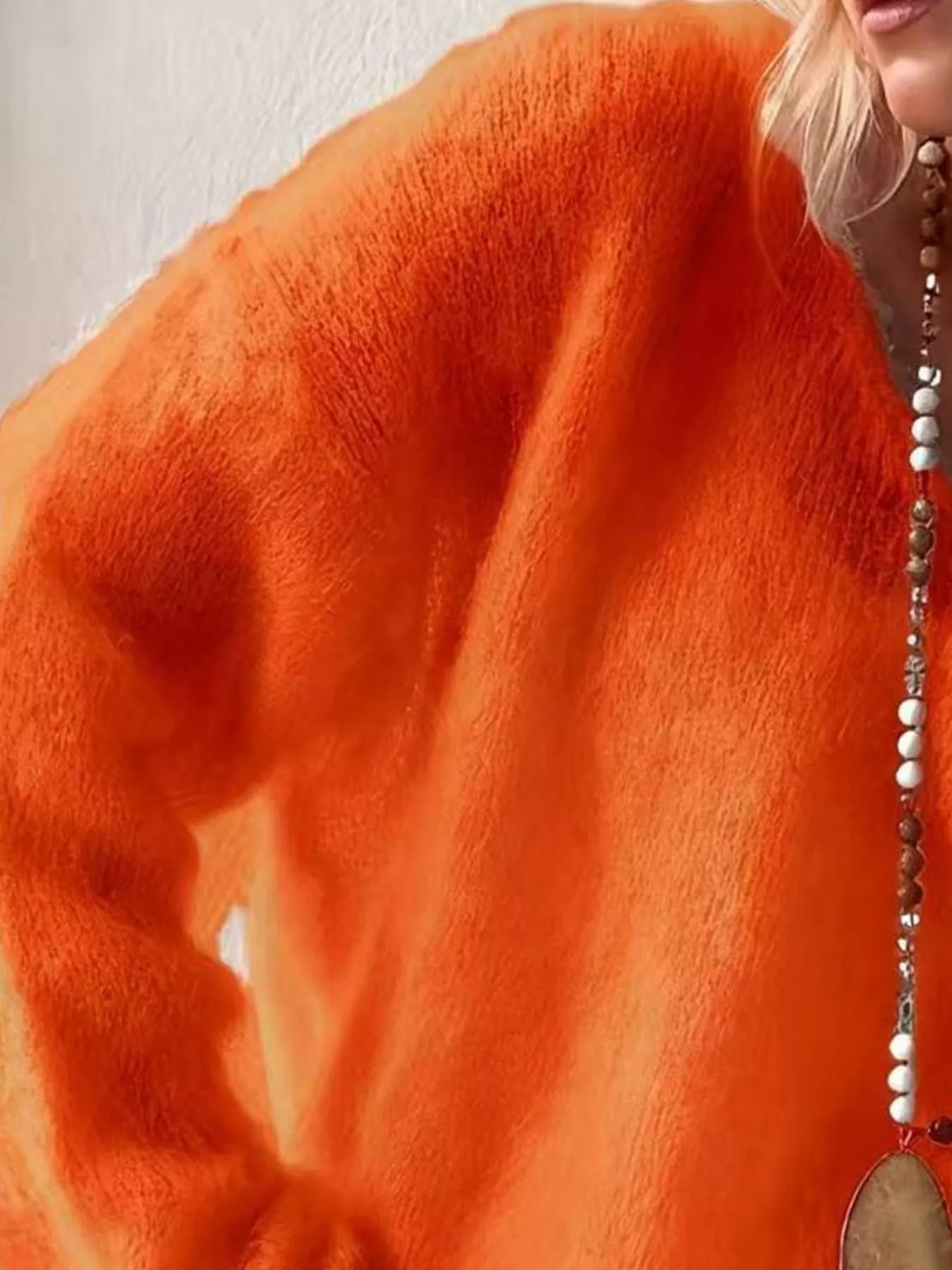 V - Neck Dropped Shoulder Sweater designed for comfort and style at Lookzlike