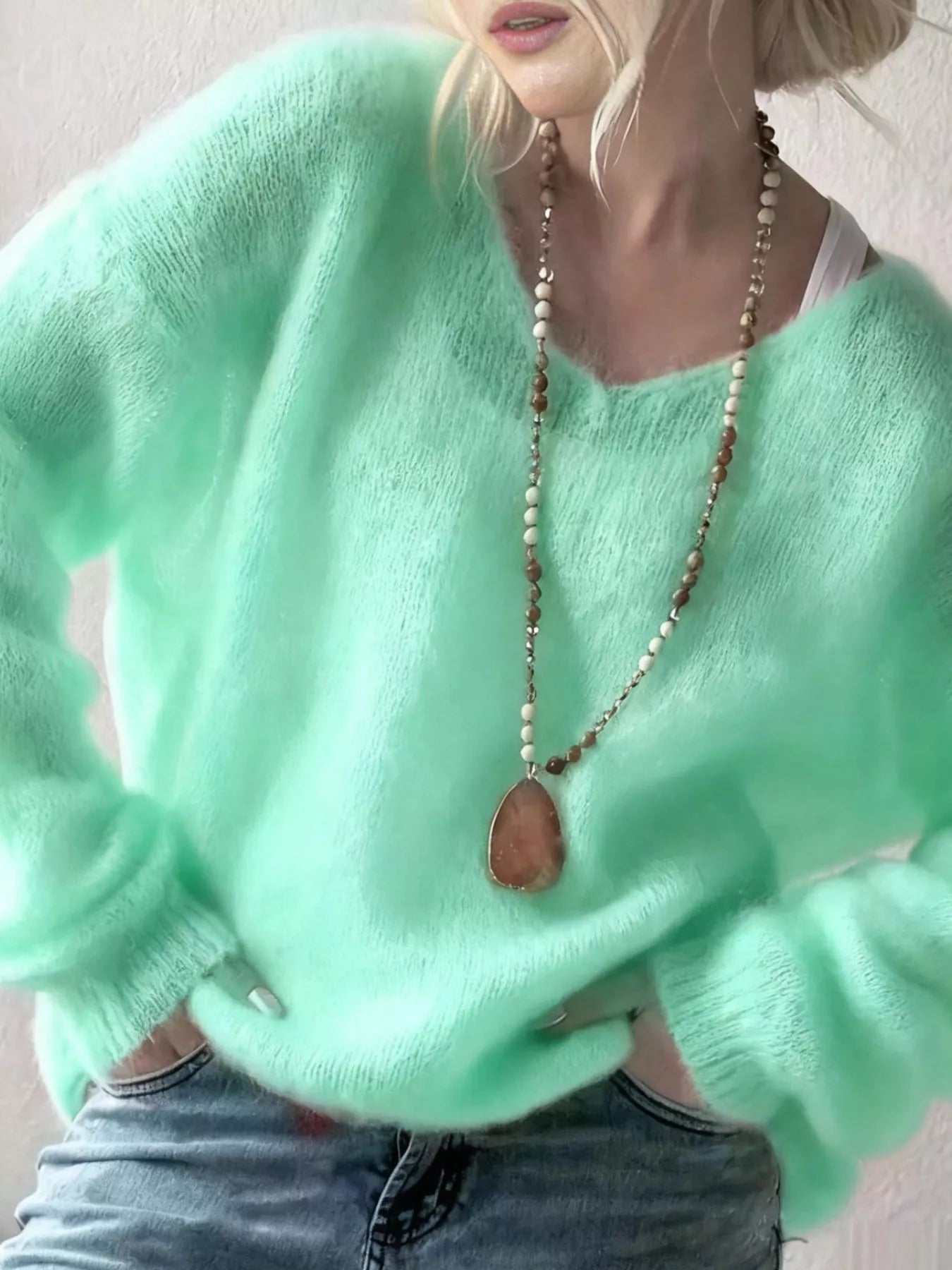 V - Neck Dropped Shoulder Sweater designed for comfort and style at Lookzlike