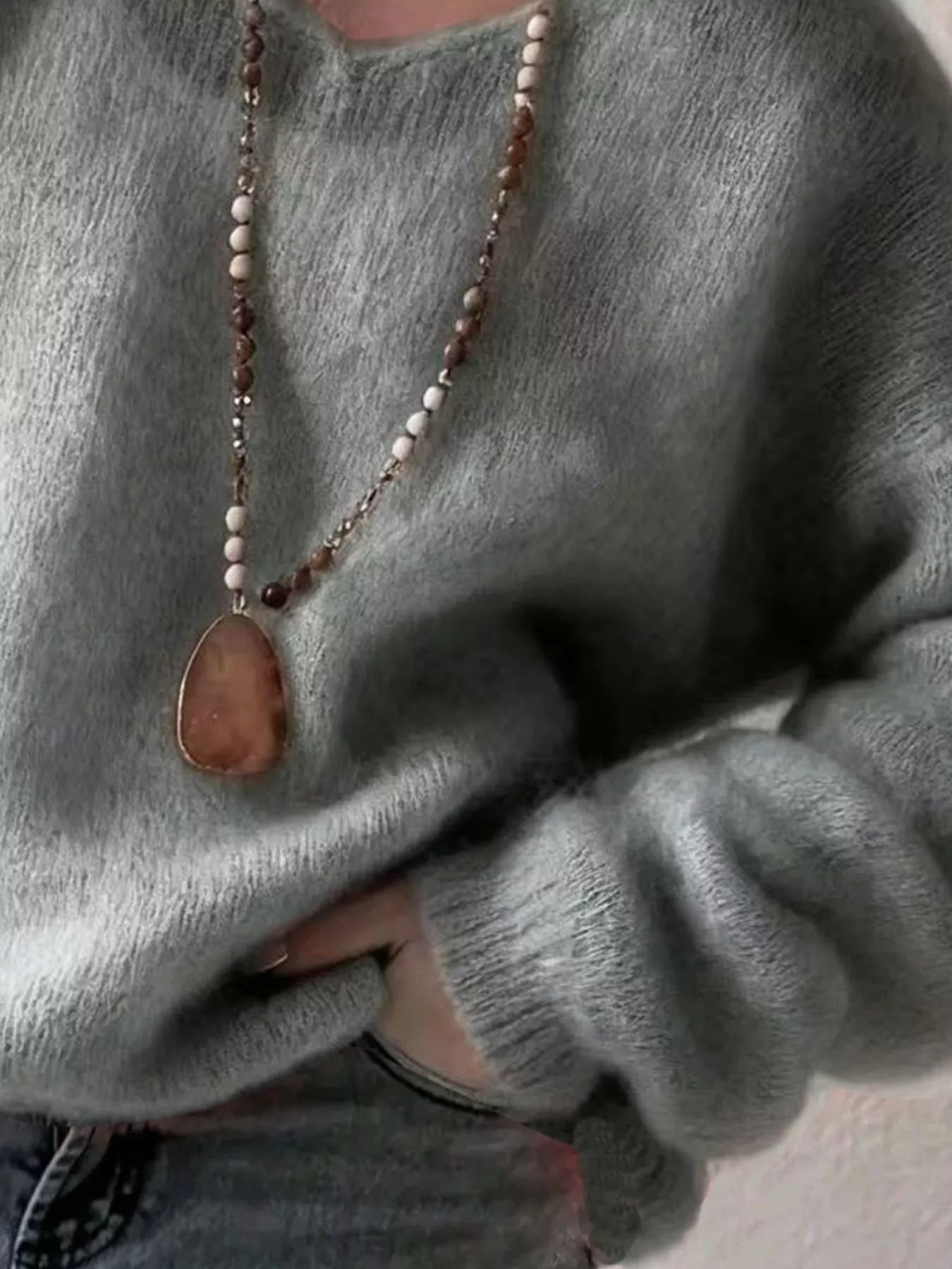 V - Neck Dropped Shoulder Sweater designed for comfort and style at Lookzlike