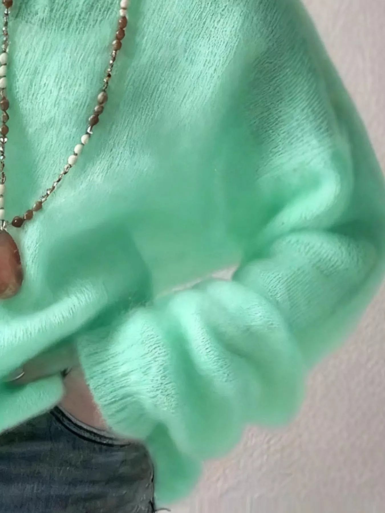 V - Neck Dropped Shoulder Sweater designed for comfort and style at Lookzlike