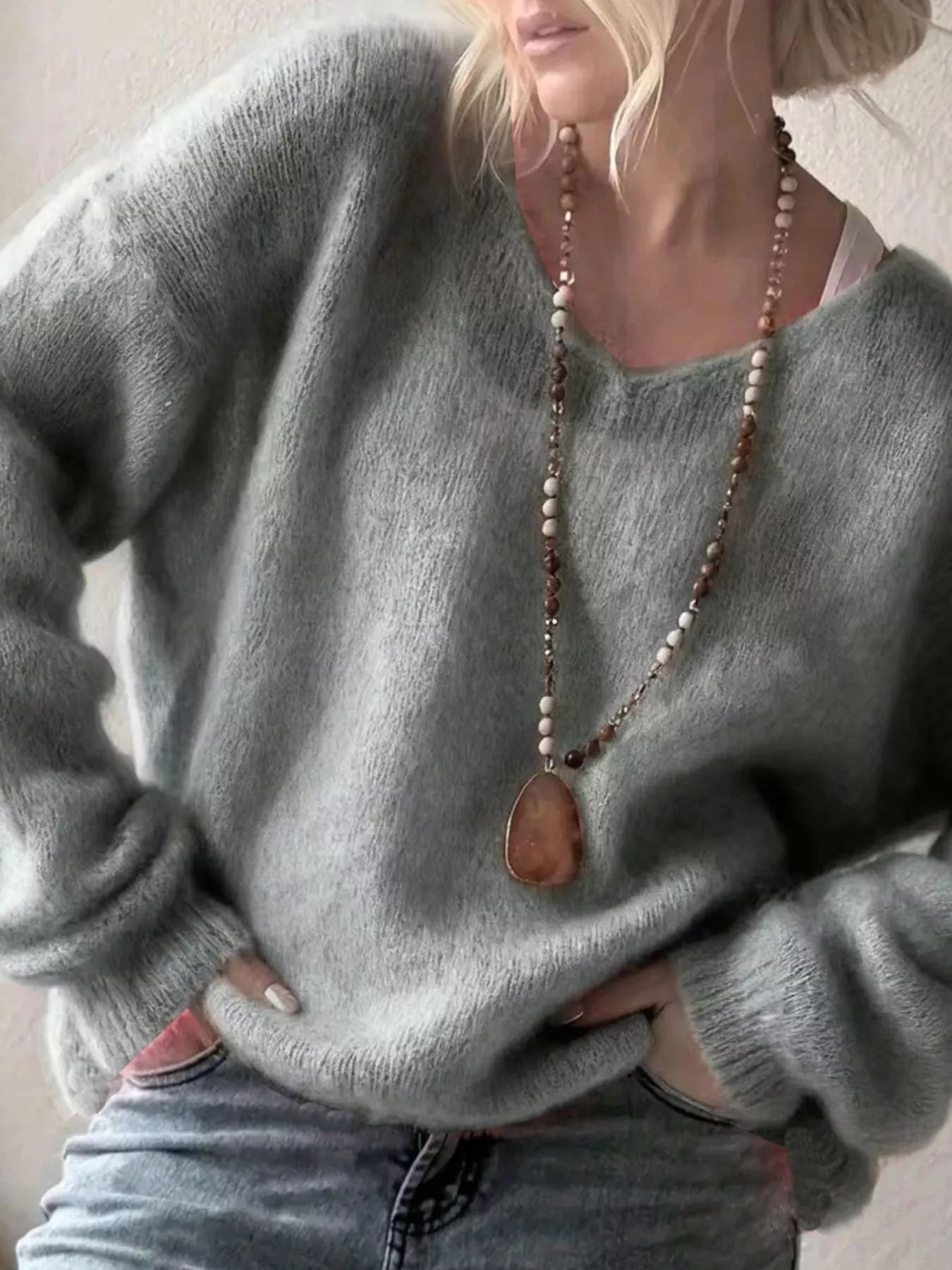 V - Neck Dropped Shoulder Sweater designed for comfort and style at Lookzlike