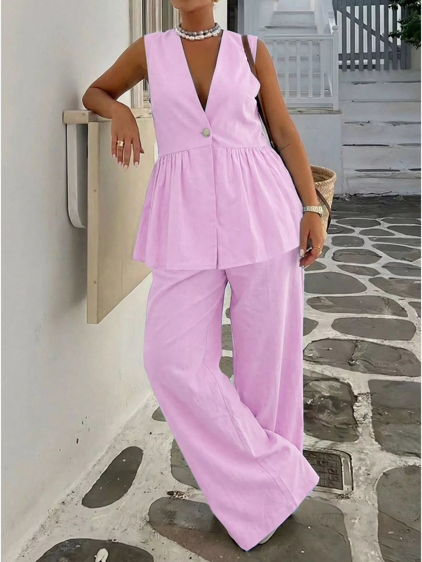 V-Neck Sleeveless Peplum Top and Wide-Leg Pants Set designed for comfort and style at Lookzlike