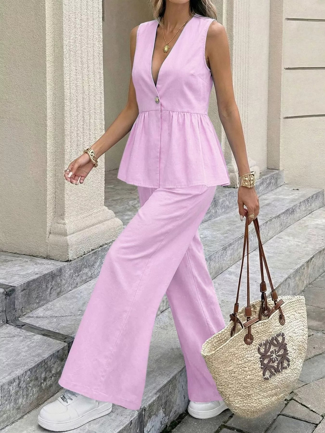 V-Neck Sleeveless Peplum Top and Wide-Leg Pants Set designed for comfort and style at Lookzlike
