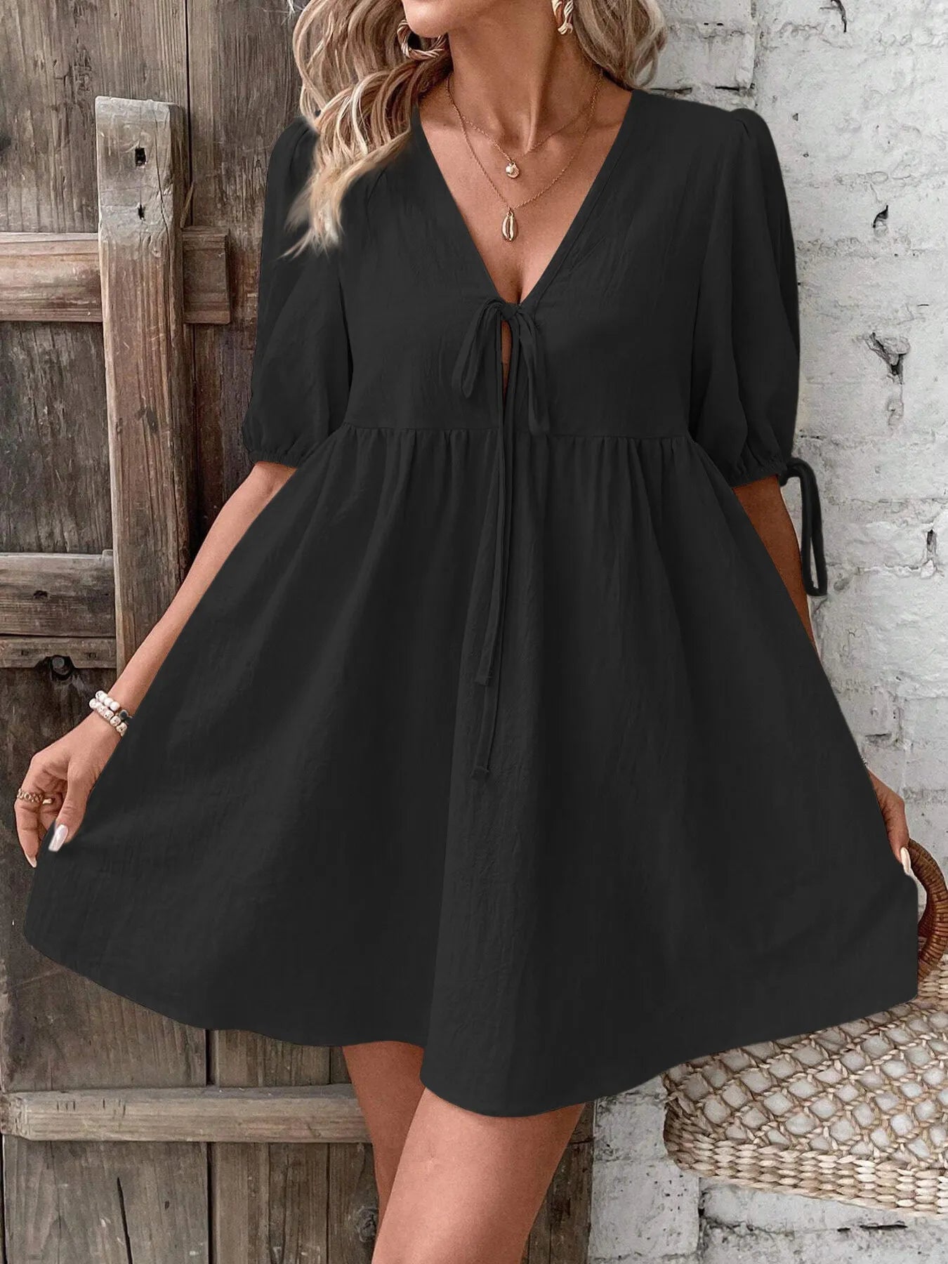 V-Neck Tie-Front Mini Dress with Puff Sleeves designed for comfort and style at Lookzlike