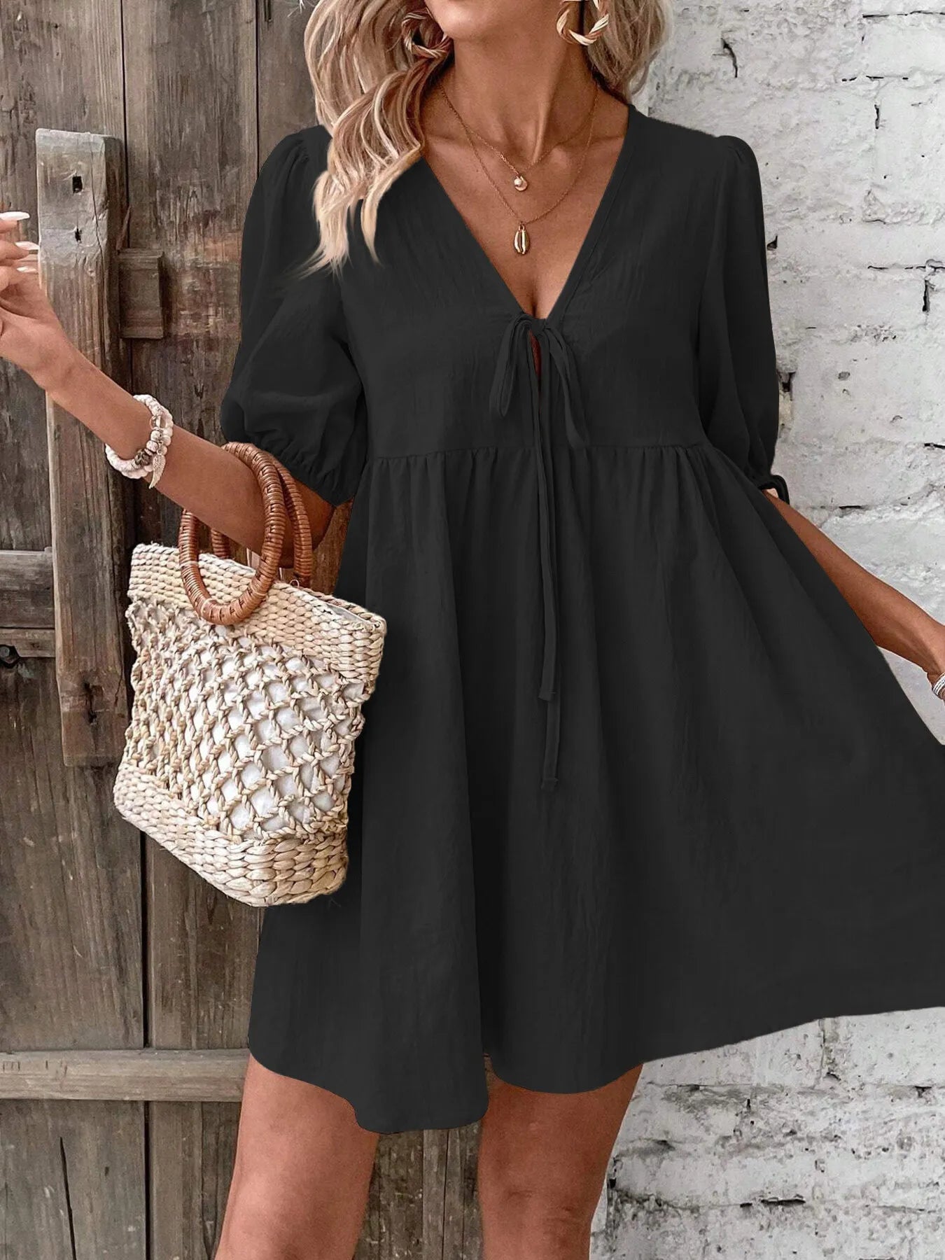 V-Neck Tie-Front Mini Dress with Puff Sleeves designed for comfort and style at Lookzlike